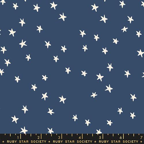 Starry Bluebell cotton fabric by Ruby Star Society featuring scattered cream stars on a deep blue background.
