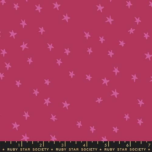 Starry Plum cotton fabric by Ruby Star Society featuring scattered pink stars on a rich plum-pink background.
