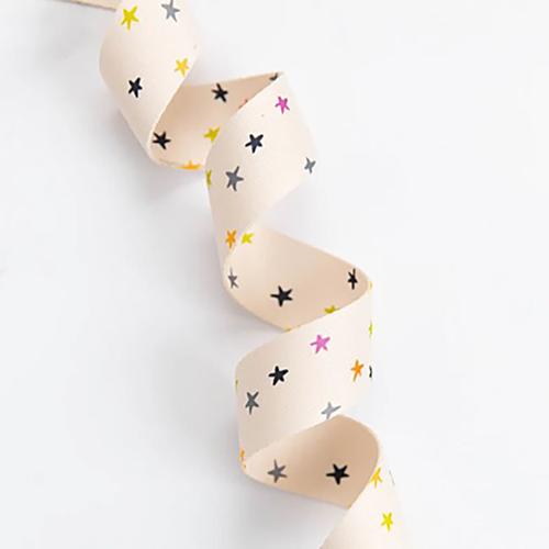 star print webbing strap natural background colorful stars