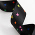 black webbing with colorful stars for bag straps and sewing projects