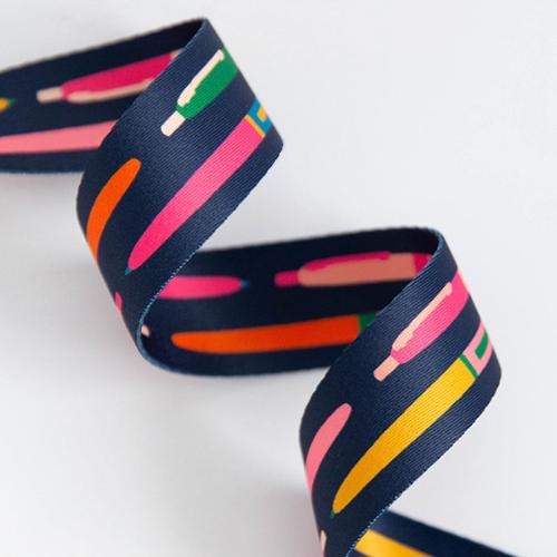 navy webbing with colorful pens for bag making and sewing projects