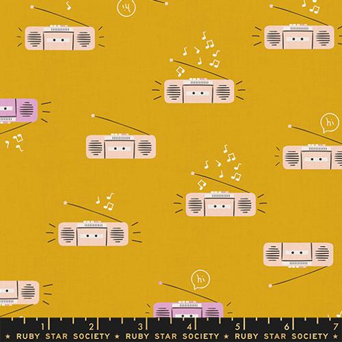 Lofi Linens Boom Cactus fabric by Ruby Star Society featuring retro radios and music notes on a warm gold-orange background.