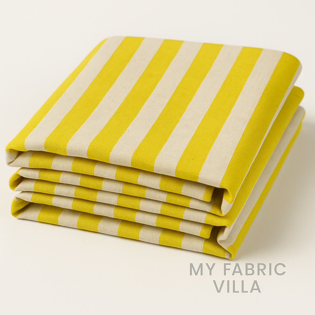 Folded stack of Primavera Cabana Stripe Yellow Canvas Fabric by Rifle Paper Co. for Cotton + Steel showing bright yellow and natural stripes.