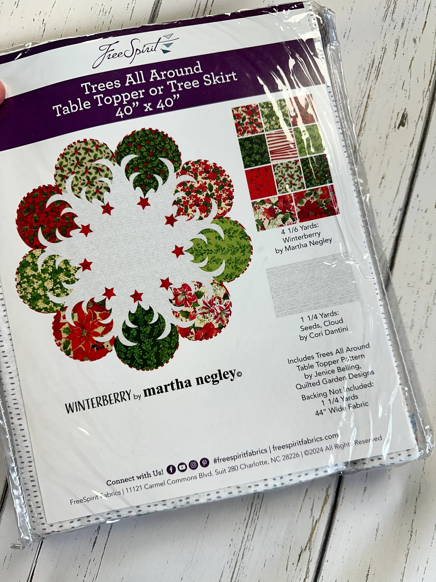 Winterberry Quilt Kit by Martha Negley for Free Spirit Fabrics featuring festive holiday quilt fabrics in red and winter floral prints