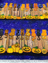 Feline Spooky Cats on Fence cotton fabric by Timeless Treasures featuring colorful Halloween cats, pumpkins, spider webs, and a rustic wooden fence.