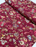 Marseille Red floral cotton fabric by Dover Hill for Benartex featuring ornate botanical flowers and foliage in burgundy, gold, cream, olive green, and blue on a rich red background.
