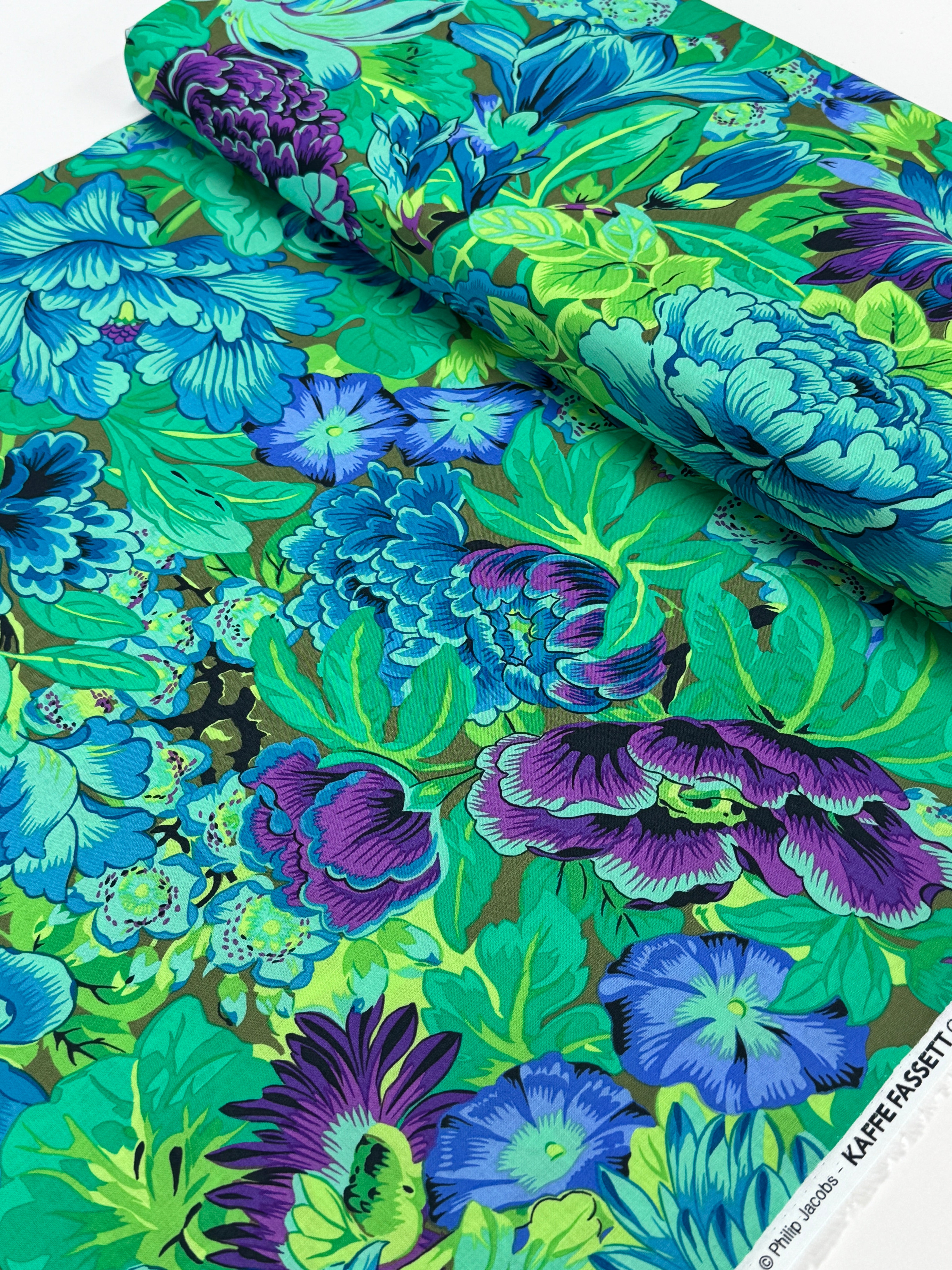 Lavinia Green fabric by Philip Jacobs for the Kaffe Fassett Collective, bold floral cotton quilting fabric with lush green leaves and botanical details.