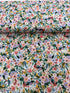 Petite Garden Party – Ivory Fabric by Rifle Paper Co. for Cotton + Steel – cream cotton fabric with small floral design.