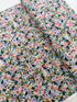 Petite Garden Party – Ivory Fabric by Rifle Paper Co. for Cotton + Steel – cream cotton fabric with small floral design.