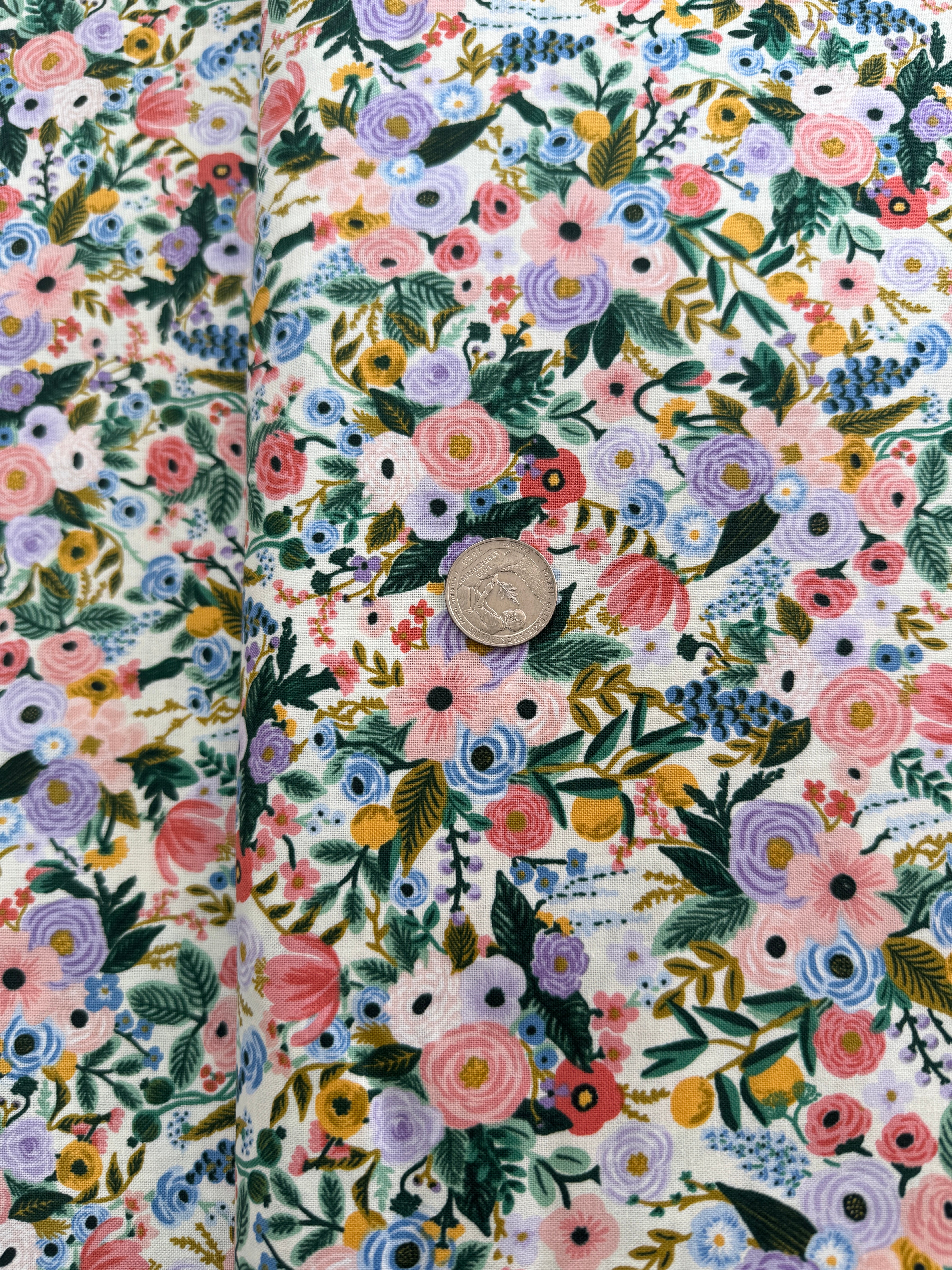 Petite Garden Party – Ivory Fabric by Rifle Paper Co. for Cotton + Steel – cream cotton fabric with small floral design.