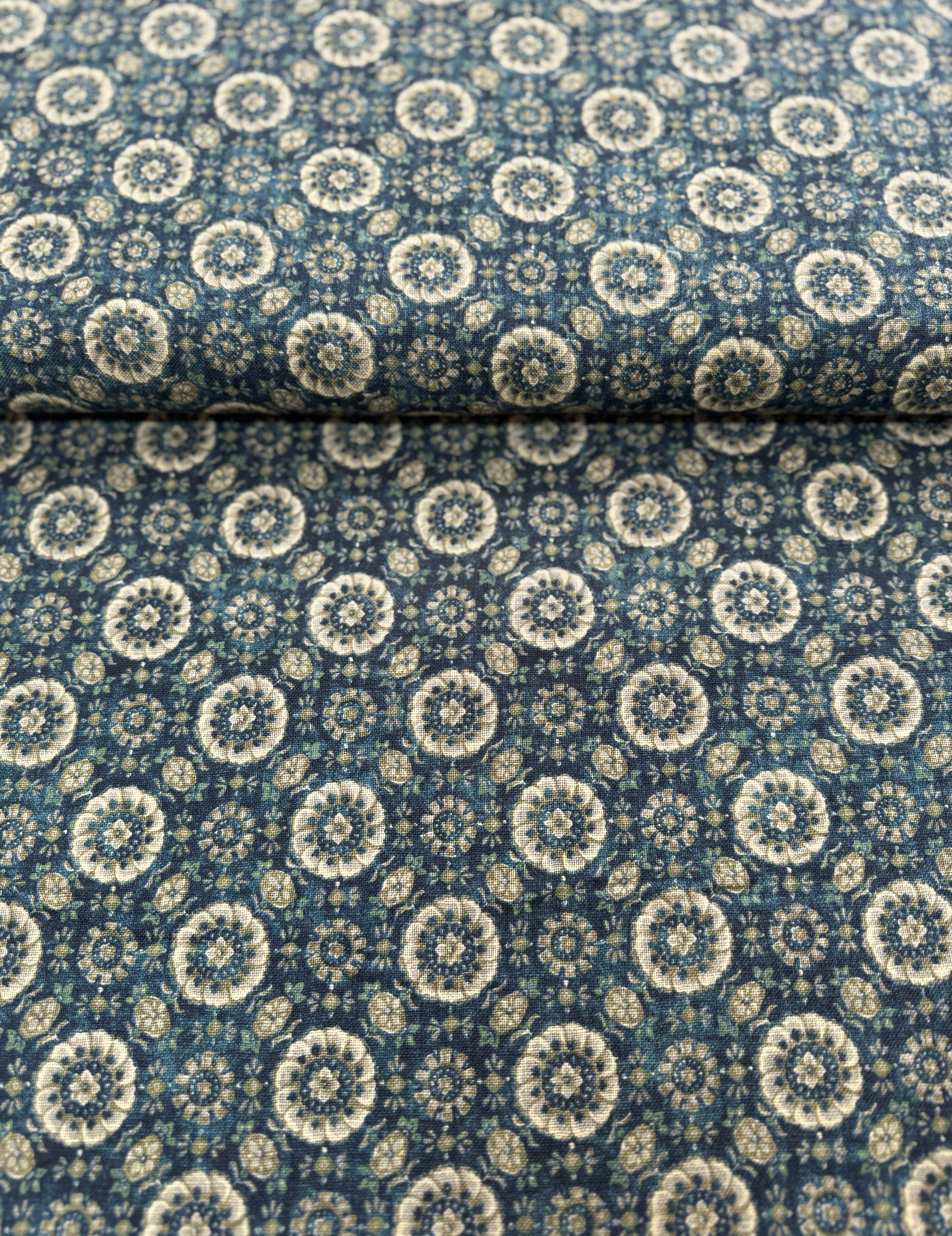 Close-up of Sevenberry Nara Homespun Florals Deep Blue fabric featuring traditional Japanese floral prints on richly textured indigo cotton.
