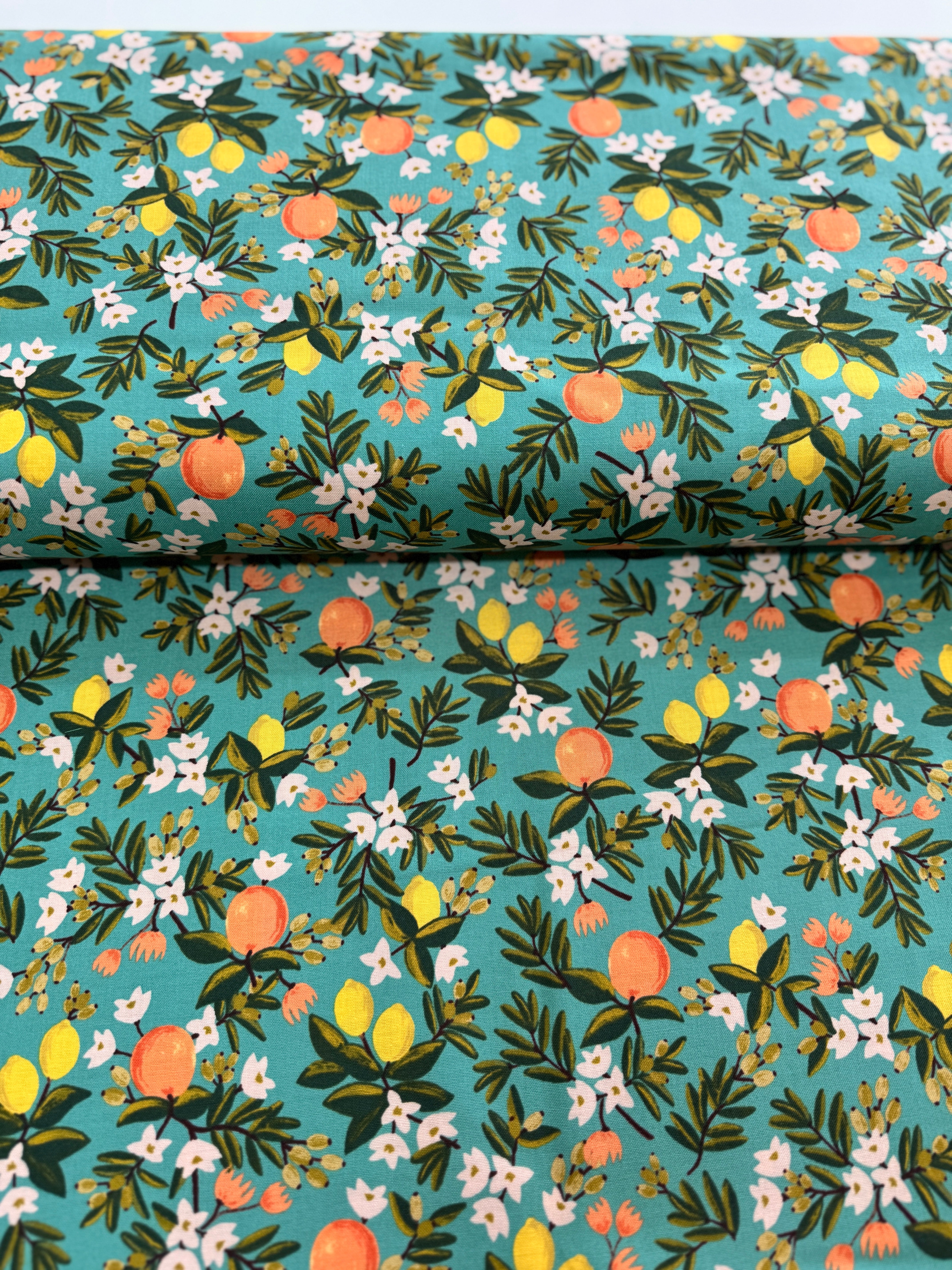 Citrus Floral Teal – teal cotton fabric with lemons and white florals by Rifle Paper Co. for Cotton + Steel.