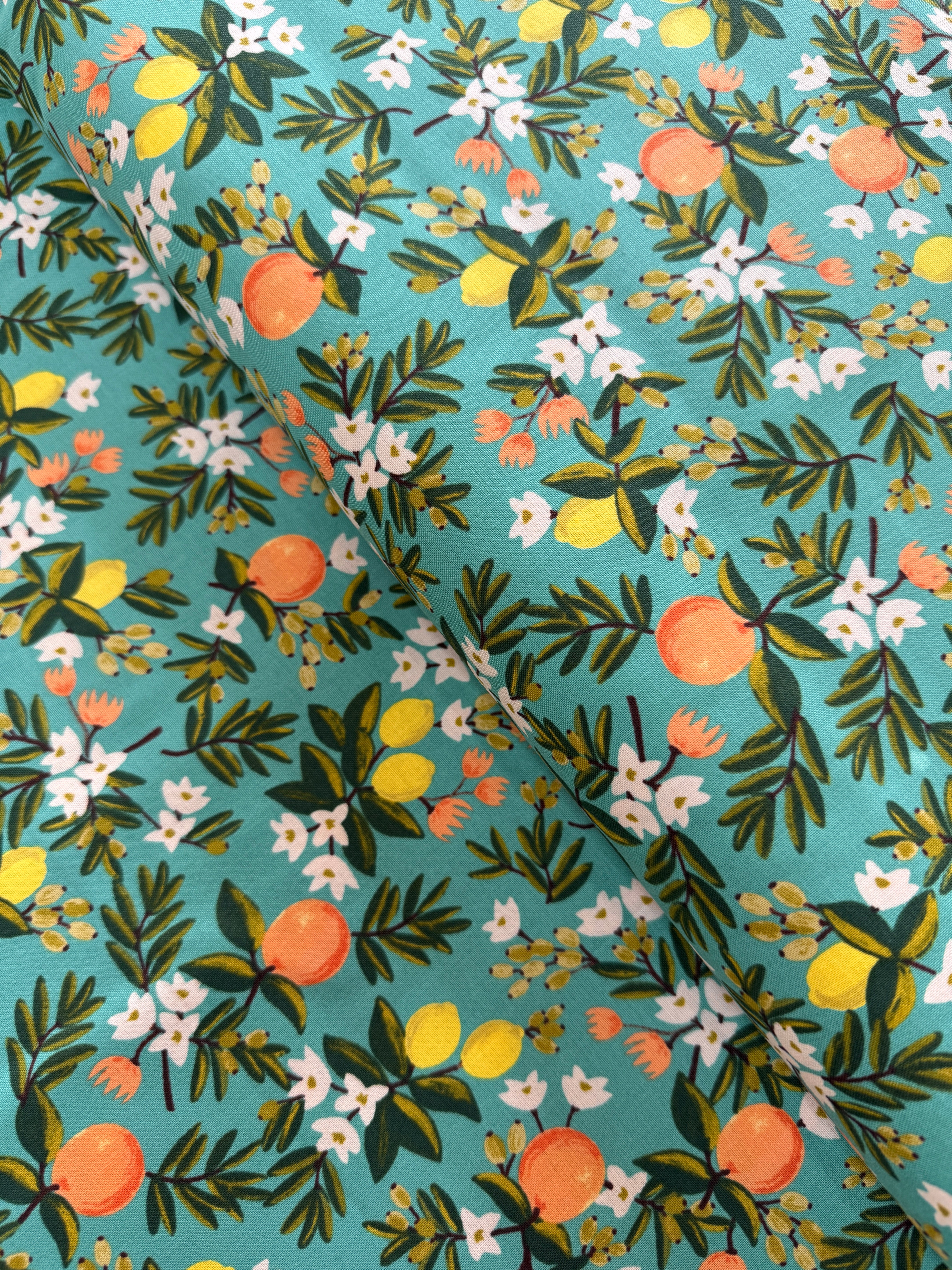 Citrus Floral Teal – teal cotton fabric with lemons and white florals by Rifle Paper Co. for Cotton + Steel.