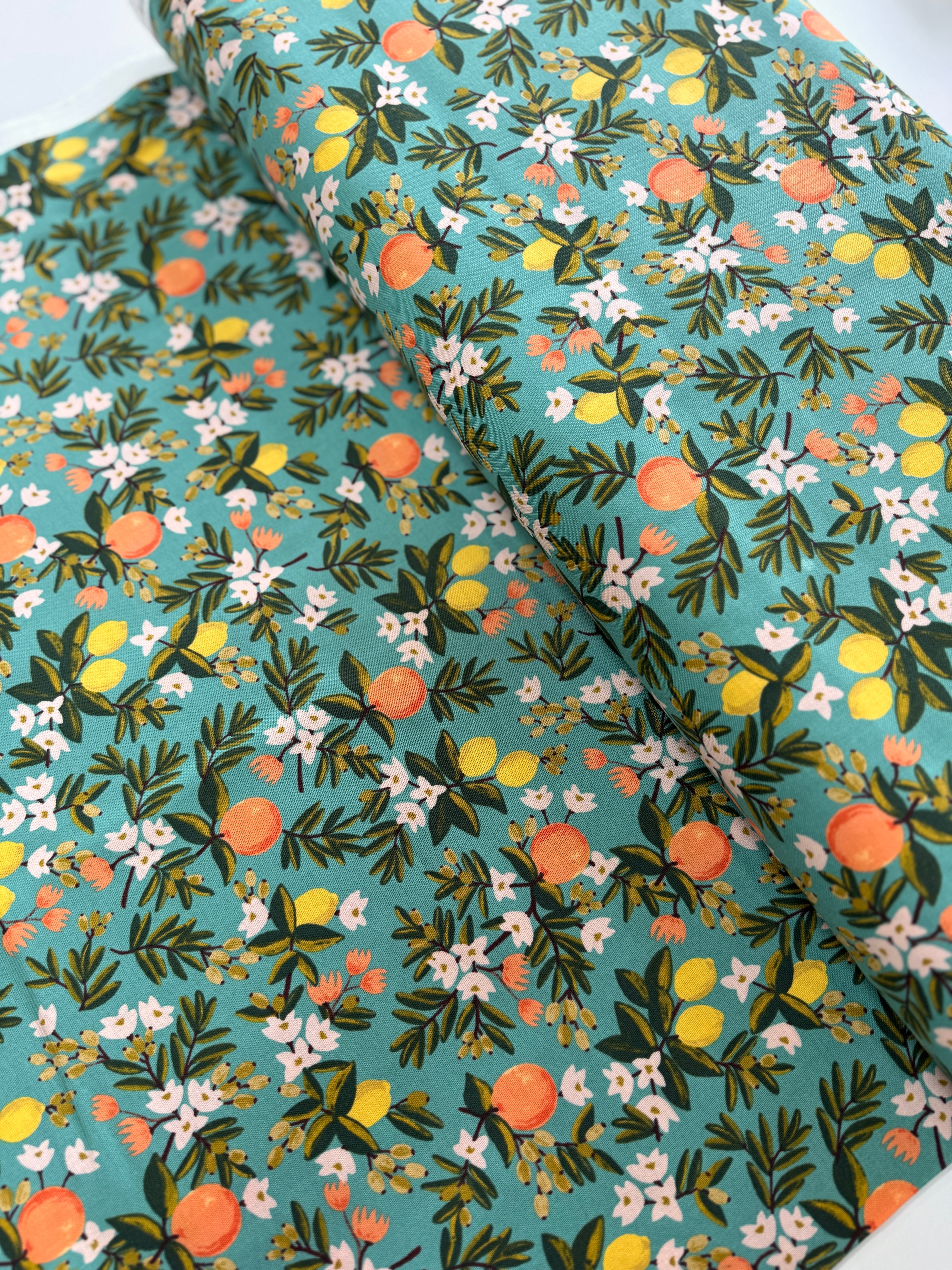Citrus Floral Teal – teal cotton fabric with lemons and white florals by Rifle Paper Co. for Cotton + Steel.