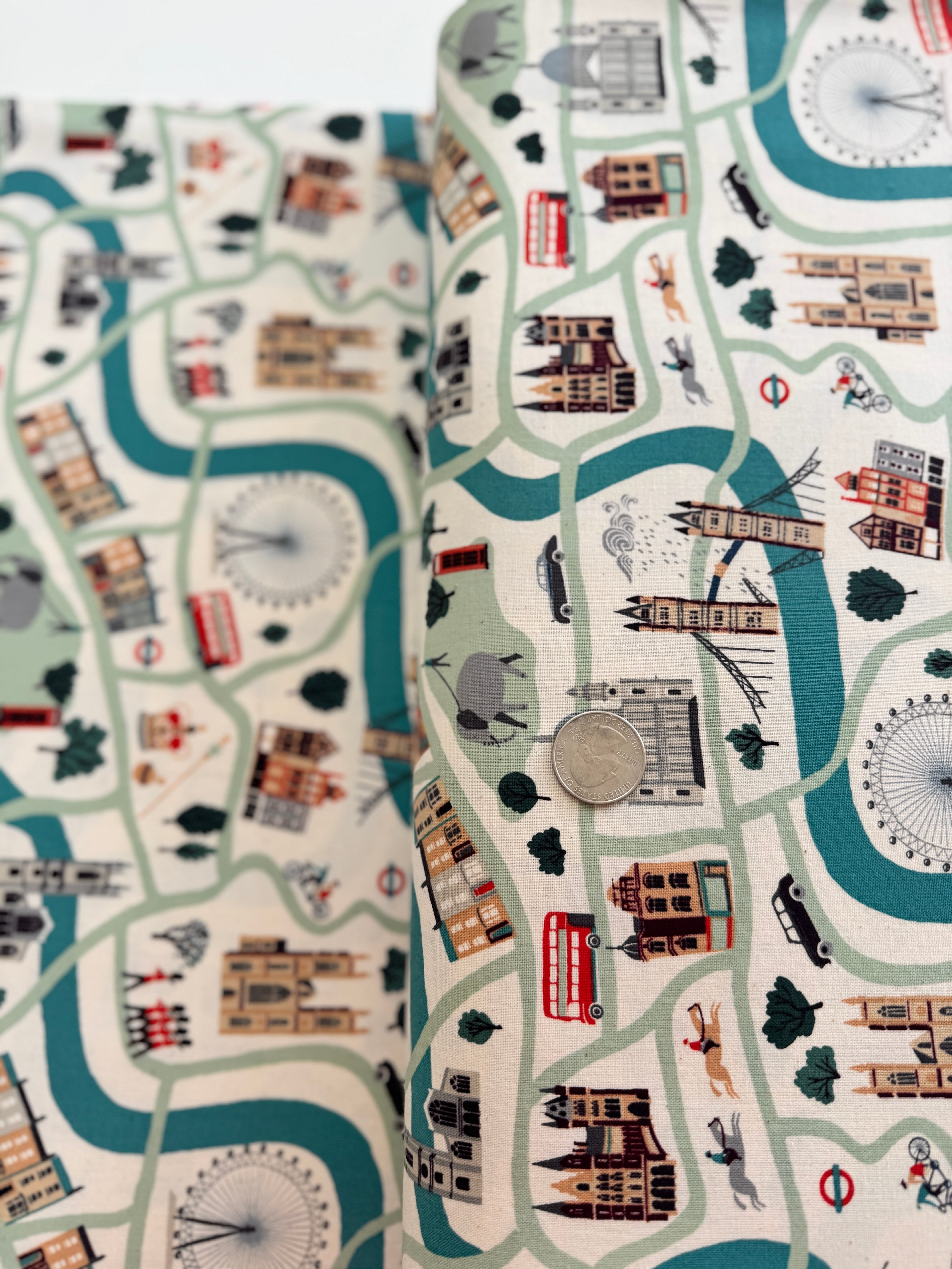 London Town London Forever White Unbleached Fabric by Sara Mulvanny for Cotton + Steel – illustrated city map print with London landmarks.