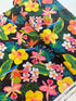 Island Sanctuary - Tropicals on Black Yardage