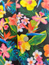 Island Sanctuary - Tropicals on Black Yardage
