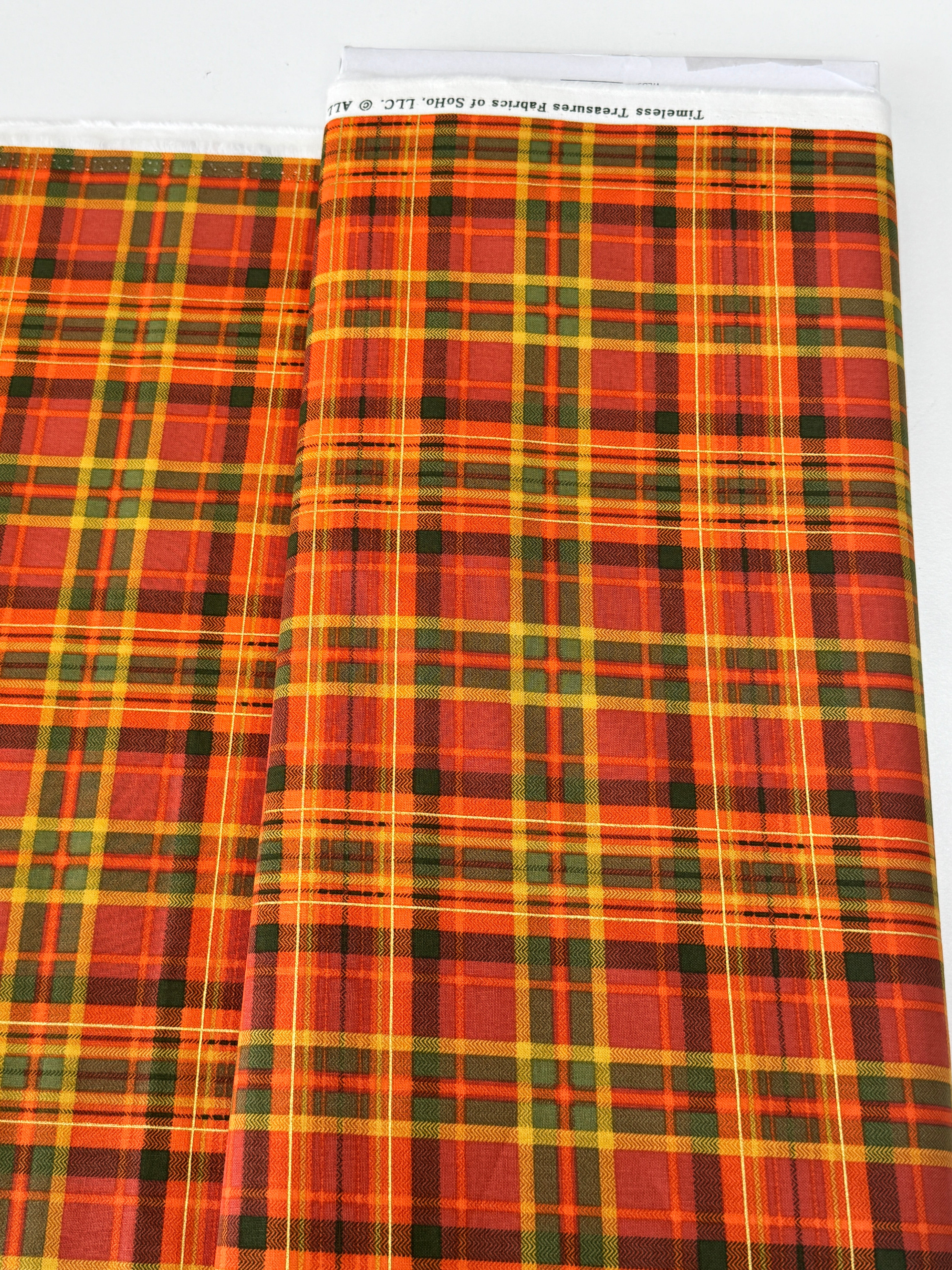 Thankful Tartan Plaids Pumpkin Metallic fabric by Timeless Treasures, close-up