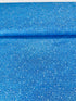Holiday Charms fabric with silver stars on blue by Studio RK for Robert Kaufman.