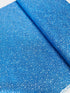 Holiday Charms fabric with silver stars on blue by Studio RK for Robert Kaufman.