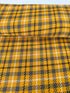 Close-up of Loomcraft Plaid Mustard fabric by Robert Kaufman – 100% cotton, heavyweight woven plaid in warm yellow tones, ideal for quilting or crafts.