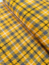 Close-up of Loomcraft Plaid Mustard fabric by Robert Kaufman – 100% cotton, heavyweight woven plaid in warm yellow tones, ideal for quilting or crafts.