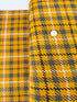 Close-up of Loomcraft Plaid Mustard fabric by Robert Kaufman – 100% cotton, heavyweight woven plaid in warm yellow tones, ideal for quilting or crafts.