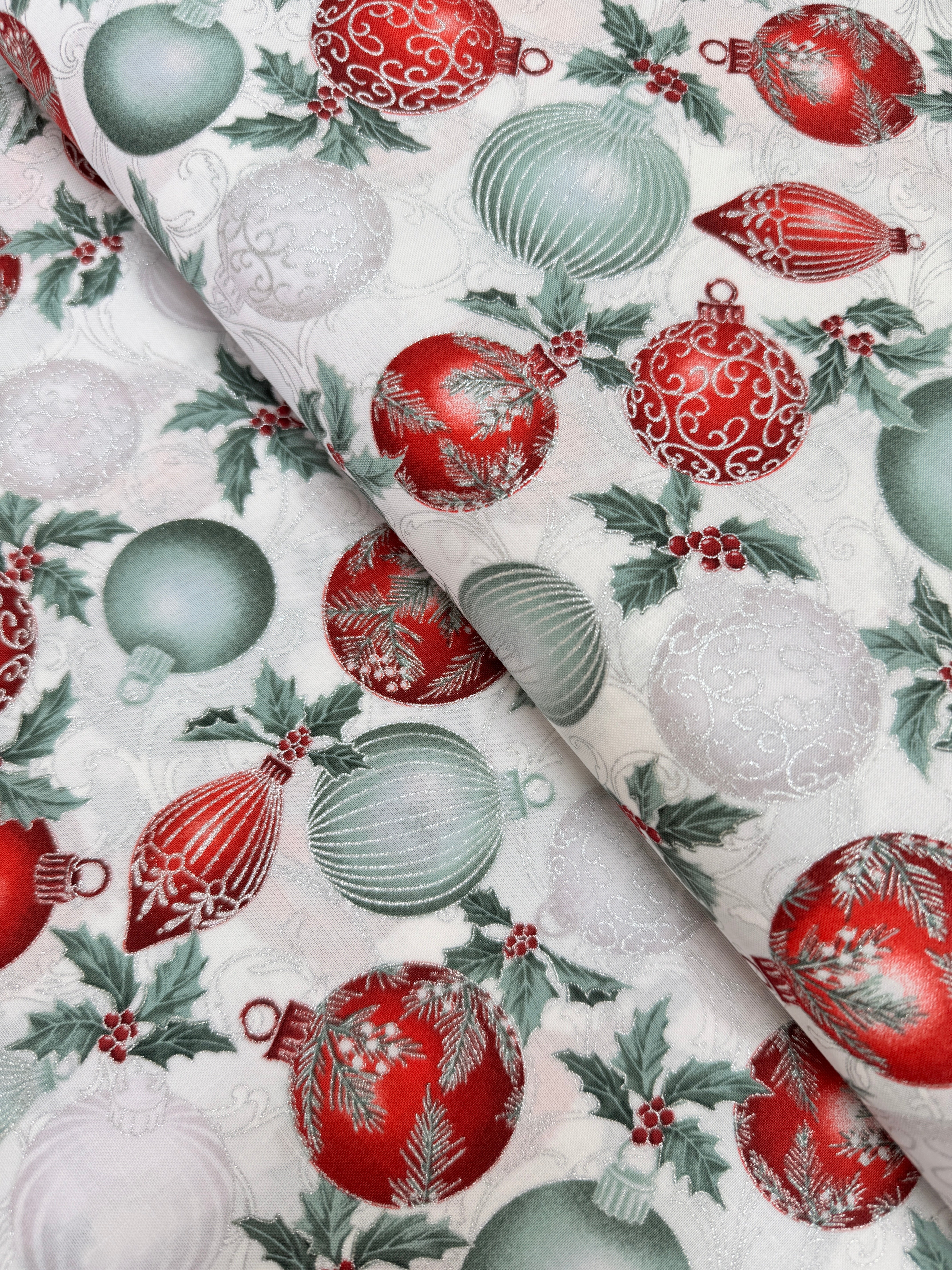 Christmas Splendor - Ornaments Winter Cherry/Silver Metallic fabric by Hoffman Fabrics with festive red and silver metallic ornament print on 100% cotton.