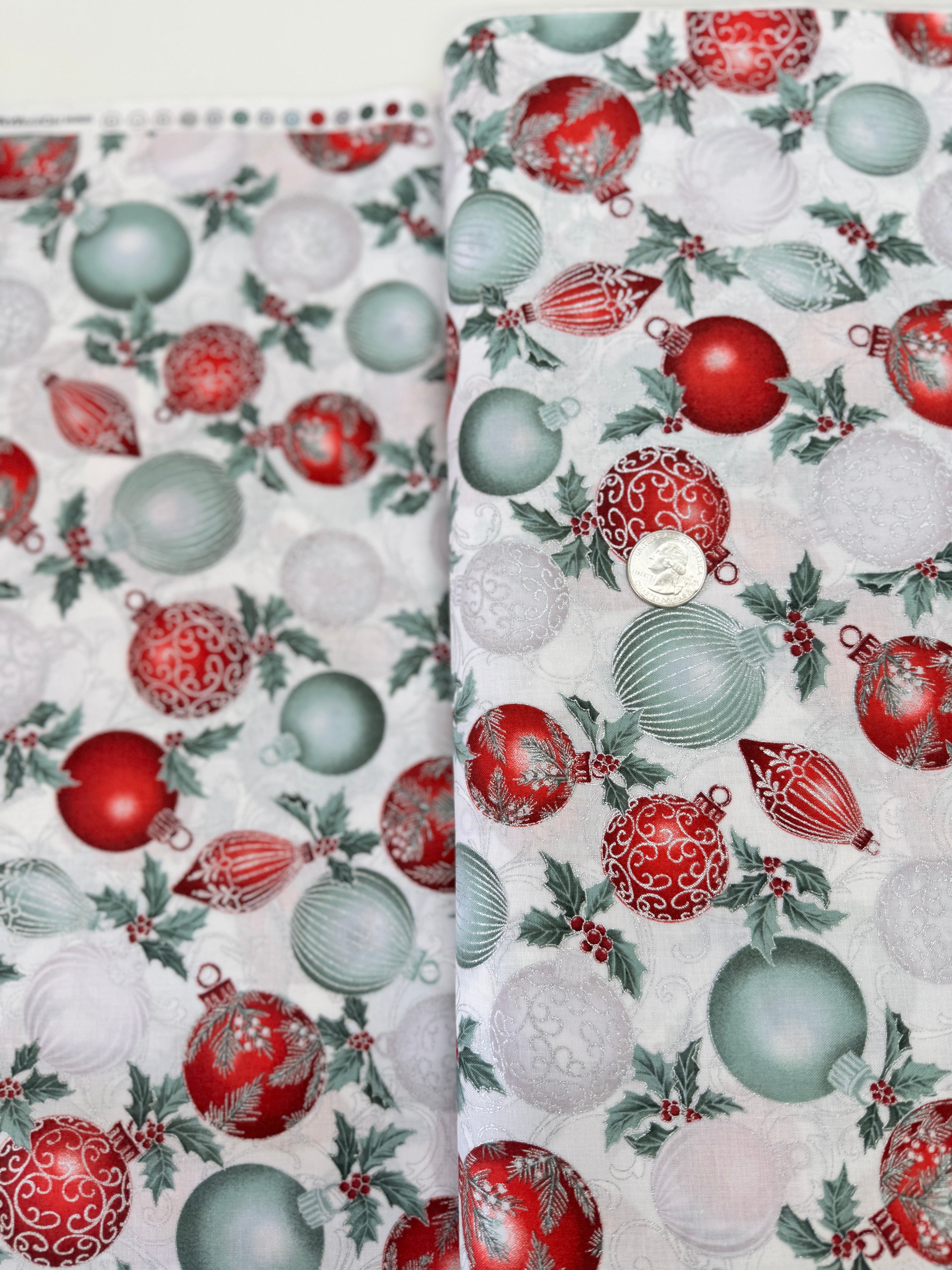 Christmas Splendor - Ornaments Winter Cherry/Silver Metallic fabric by Hoffman Fabrics with festive red and silver metallic ornament print on 100% cotton.