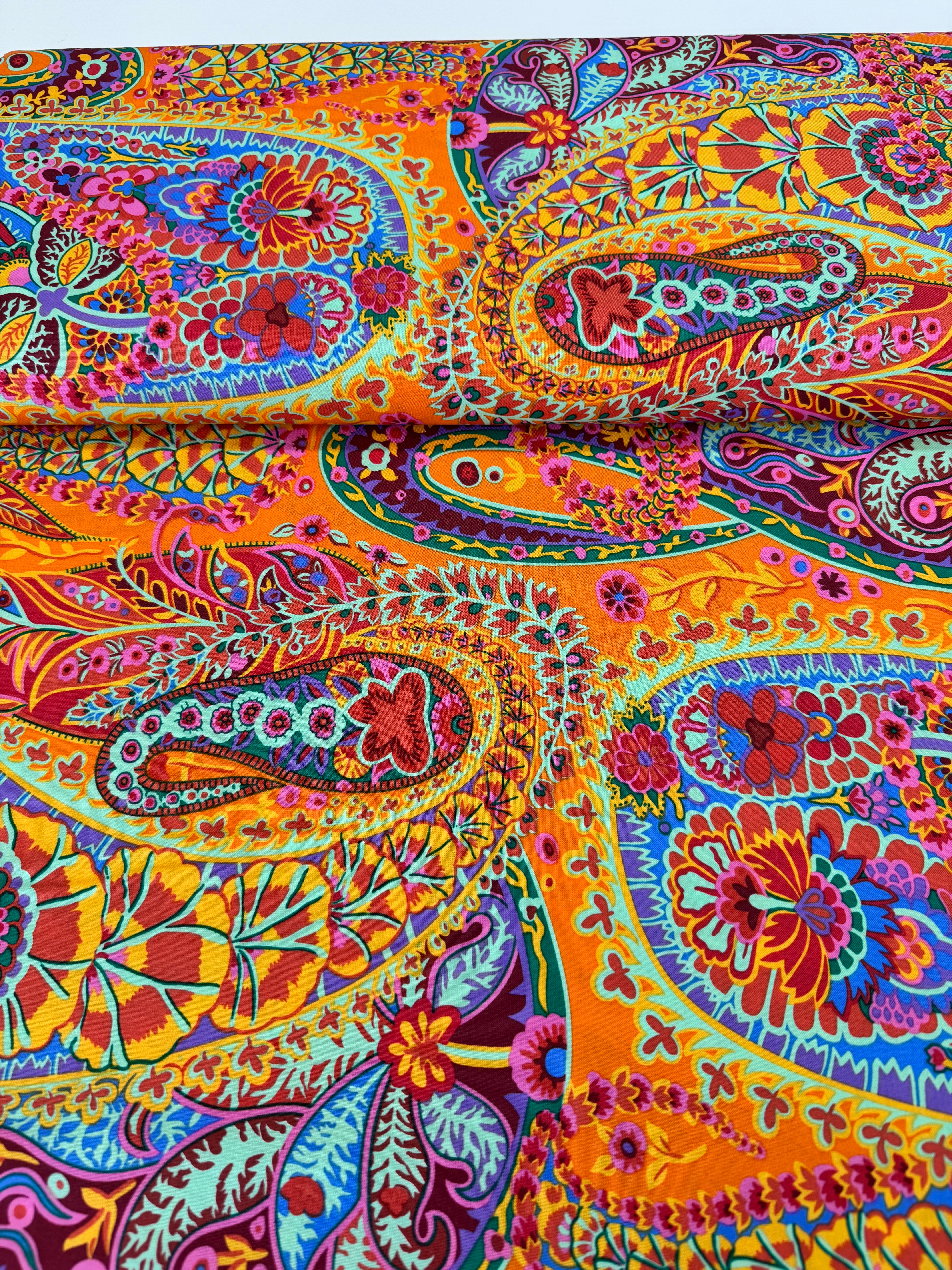 Kaffe Fassett Collective Paisley Jungle Tangerine Fabric GP60.TANG – vibrant multicolored paisley motifs on a rich tangerine background.