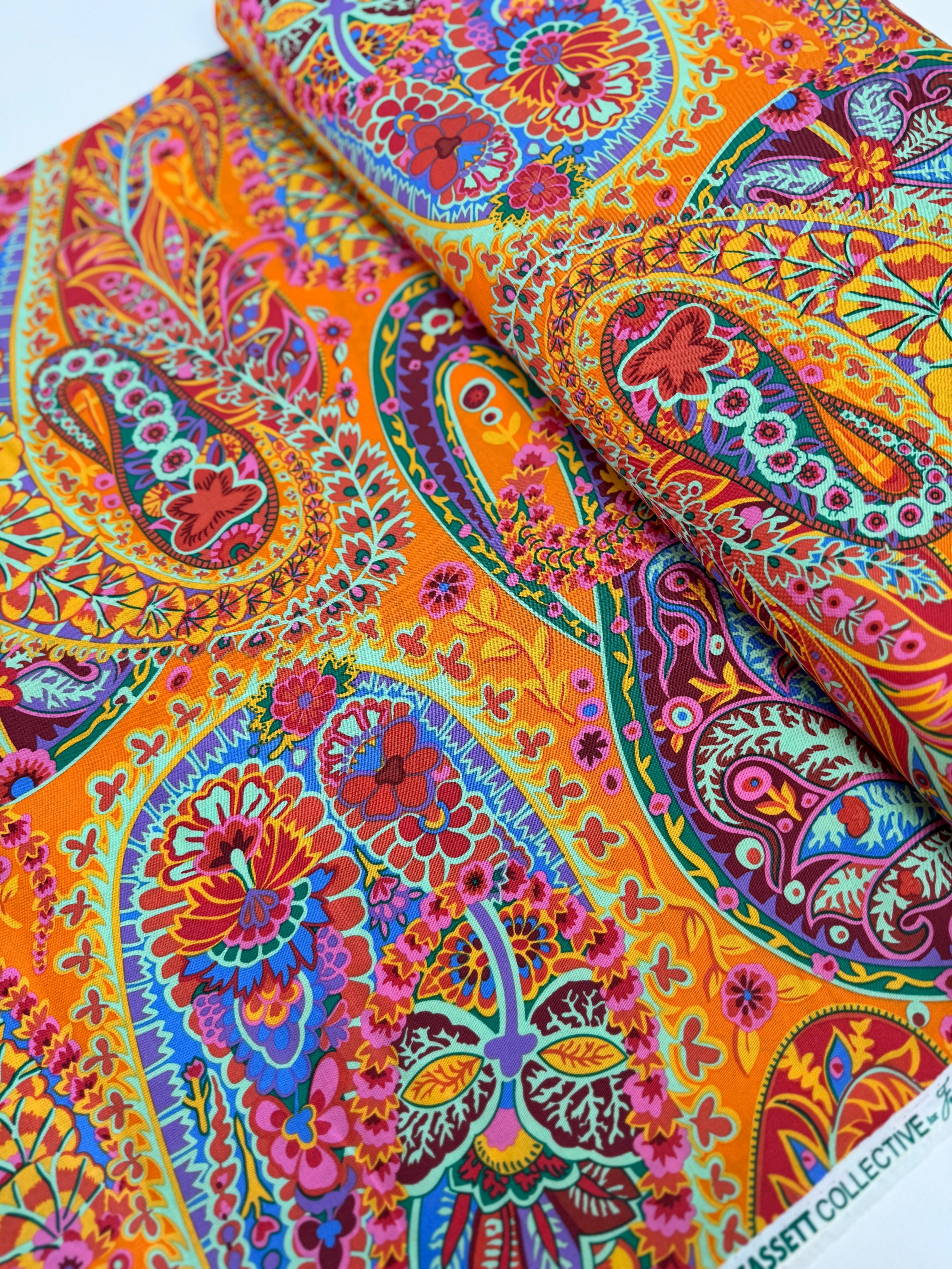 Kaffe Fassett Collective Paisley Jungle Tangerine Fabric GP60.TANG – vibrant multicolored paisley motifs on a rich tangerine background.