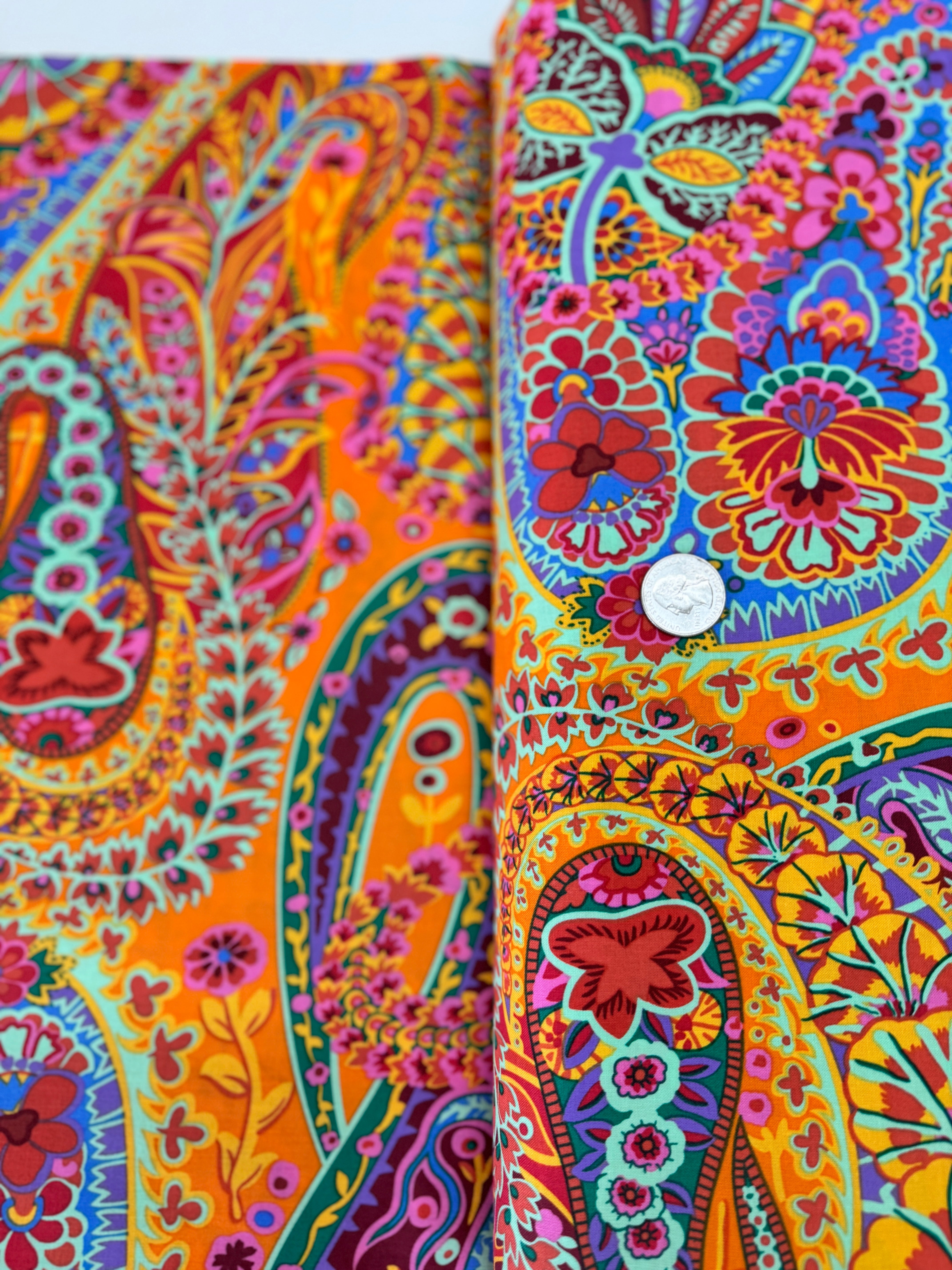 Kaffe Fassett Collective Paisley Jungle Tangerine Fabric GP60.TANG – vibrant multicolored paisley motifs on a rich tangerine background.