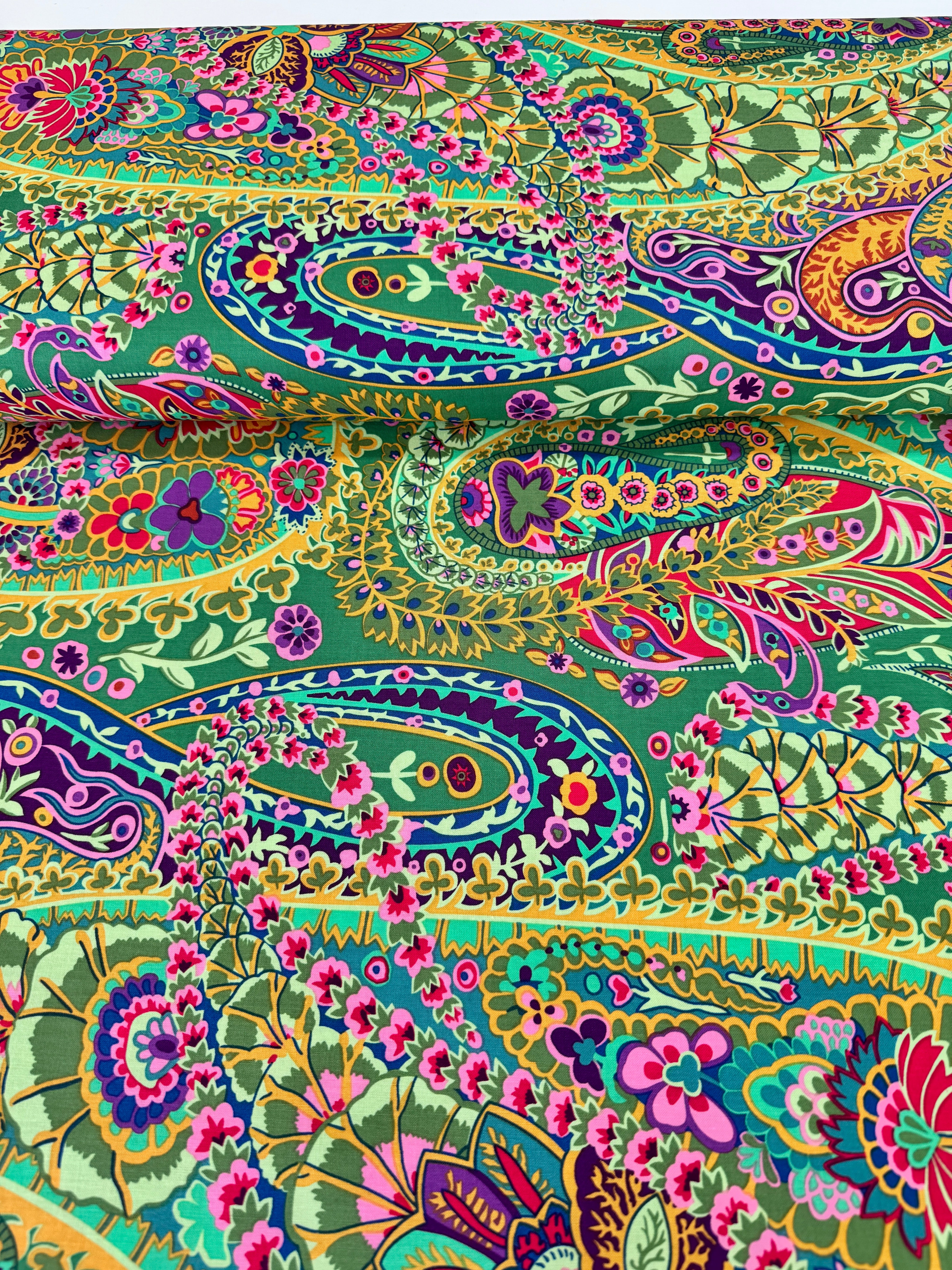 Kaffe Fassett Collective Paisley Jungle Green Fabric GP60.GREEN – vibrant multicolored paisley motifs on a rich green background.