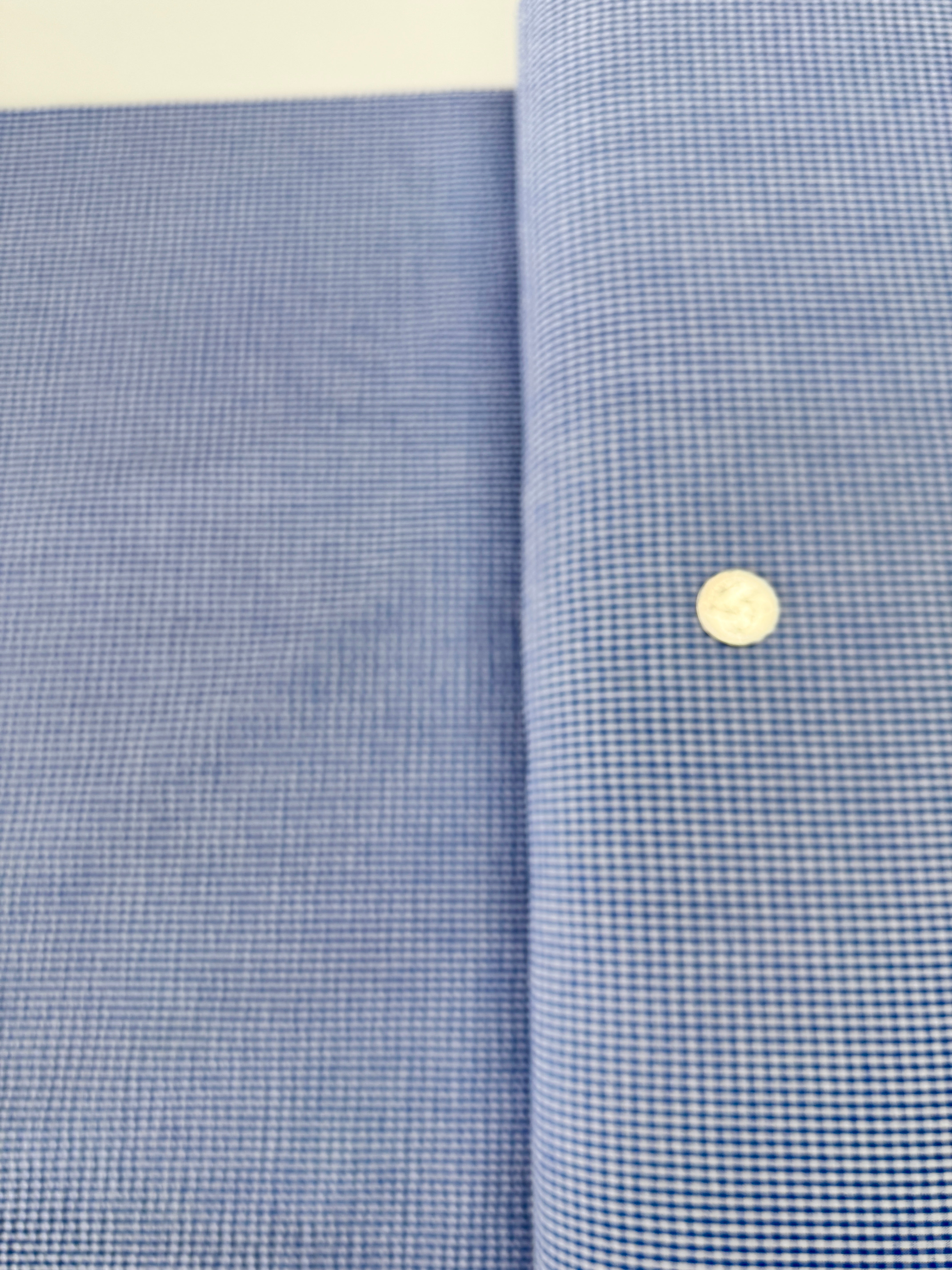 Seersucker Check Royal Fabric by Robert Kaufman – lightweight cotton/poly blend with royal blue checks and puckered texture.
