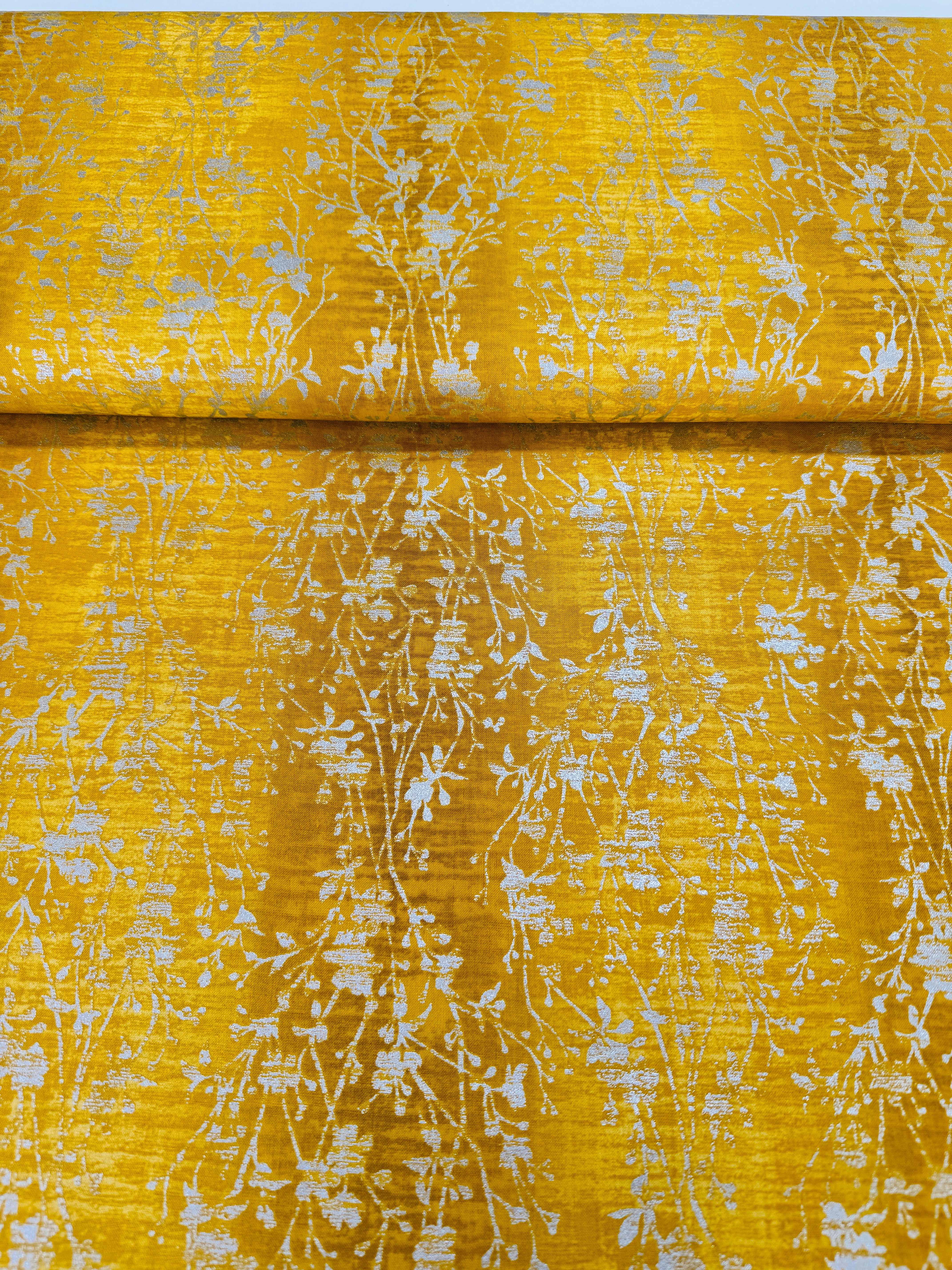 Shiny Objects – Velvety Vines Daffodil Metallic Fabric by Flaurie & Finch – Yellow cotton fabric with delicate gold metallic vine pattern.