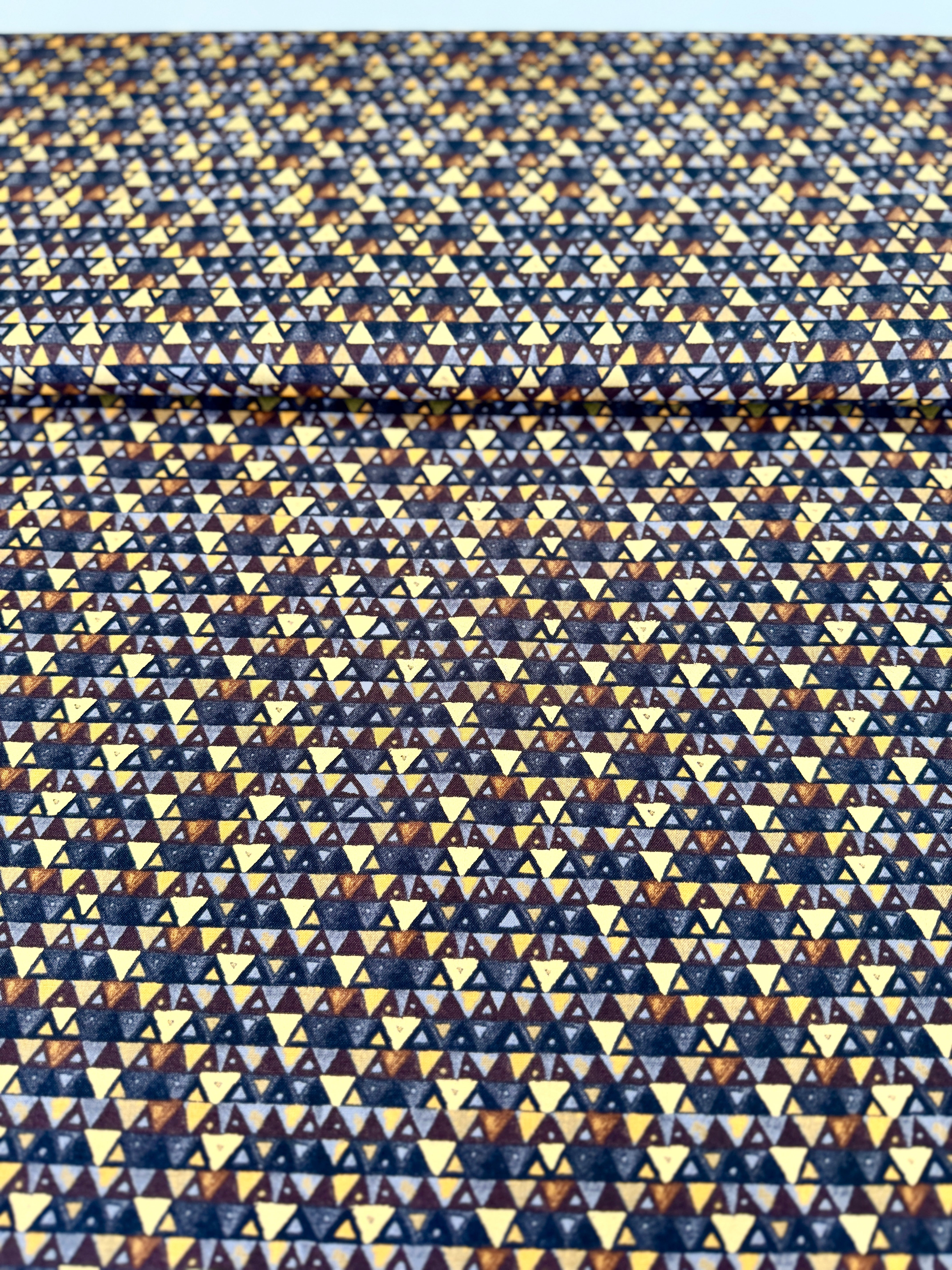 Gustav Klimt – Triangles Black Gold Metallic Fabric by Studio RK – Black cotton fabric with gold metallic triangle pattern.