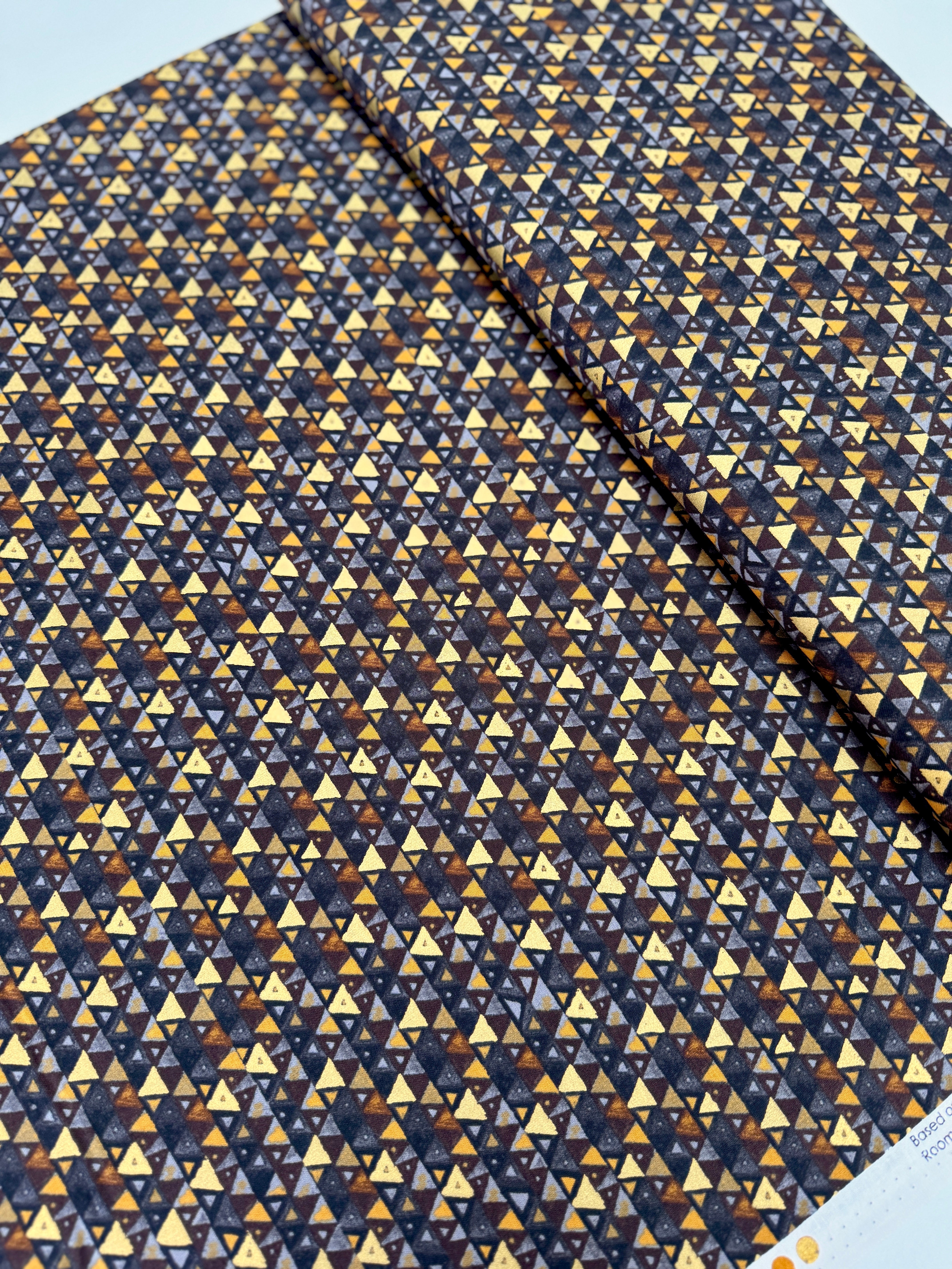 Gustav Klimt – Triangles Black Gold Metallic Fabric by Studio RK – Black cotton fabric with gold metallic triangle pattern.