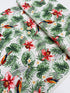 Island Paradise – Tropical Leaves and Birds on Ivory fabric by Sevenberry for Robert Kaufman – Cotton fabric with botanical leaves and colorful birds.