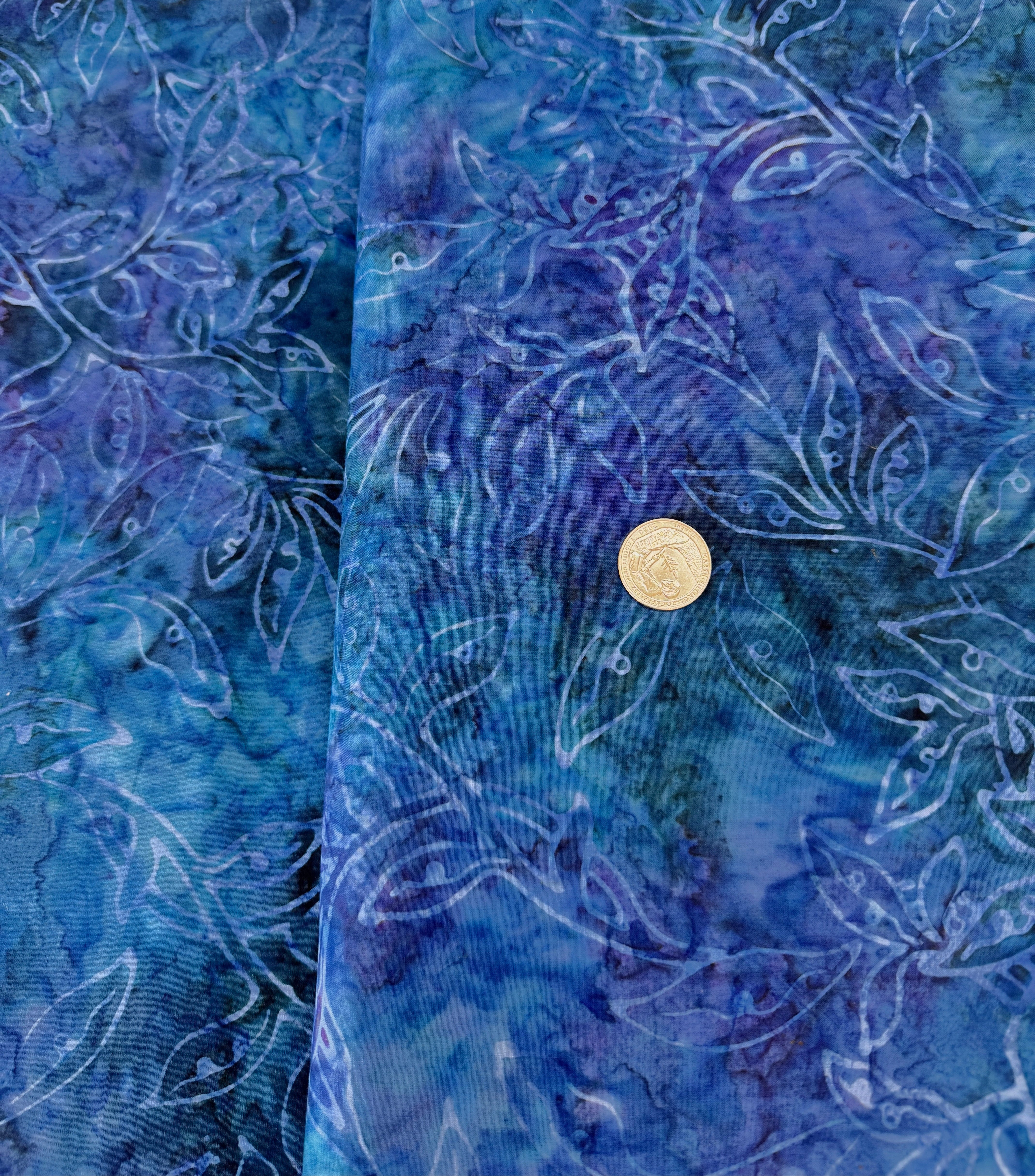 Best of Malam Batiks – Vine Leaf Sapphire Fabric by Jinny Beyer – deep blue hand-dyed batik cotton with leaf pattern.