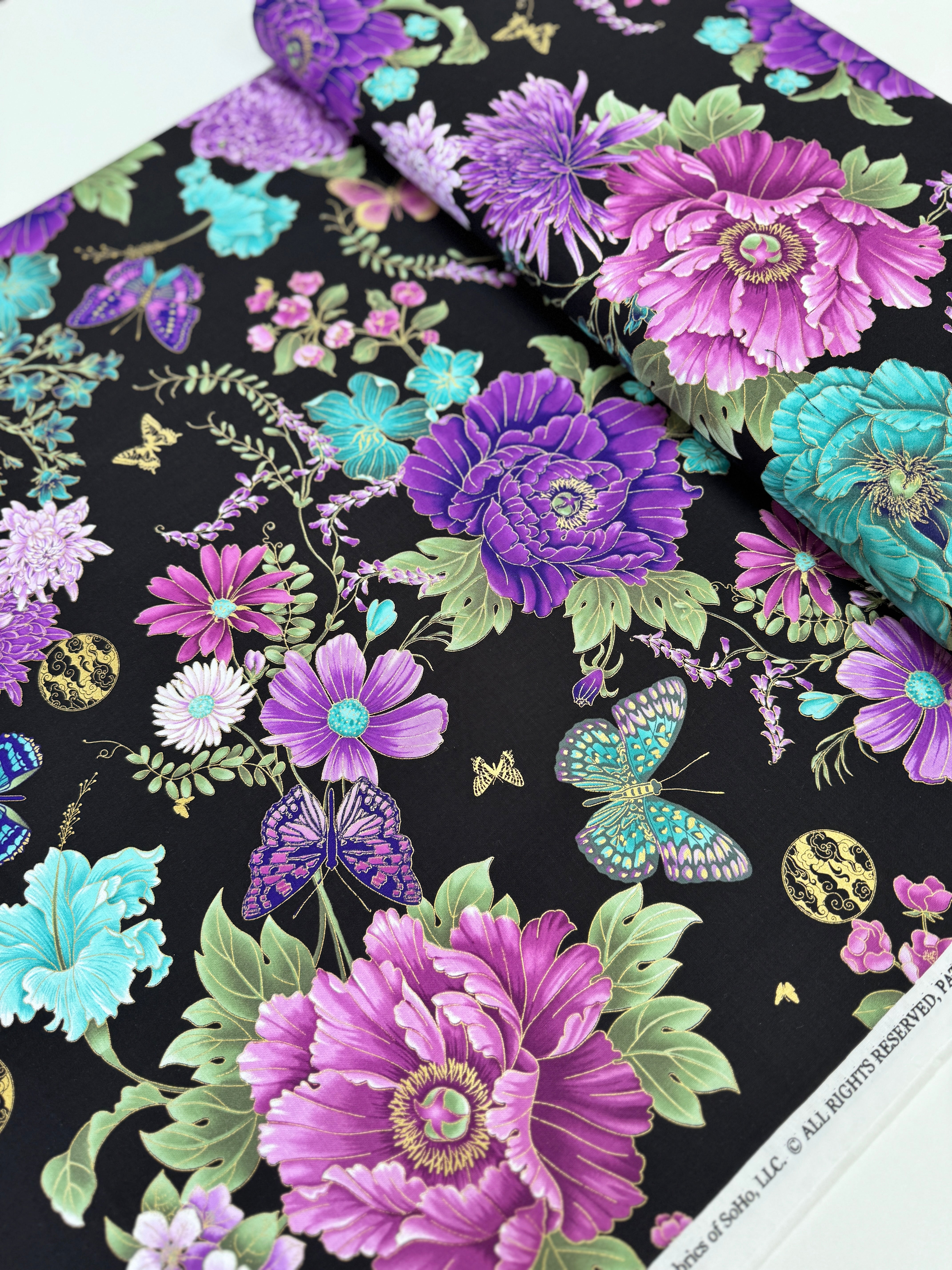 Shizuka – Asian Floral and Butterflies Metallic Fabric by Chong-a Hwang – gold-accented cotton with floral and butterfly motifs.