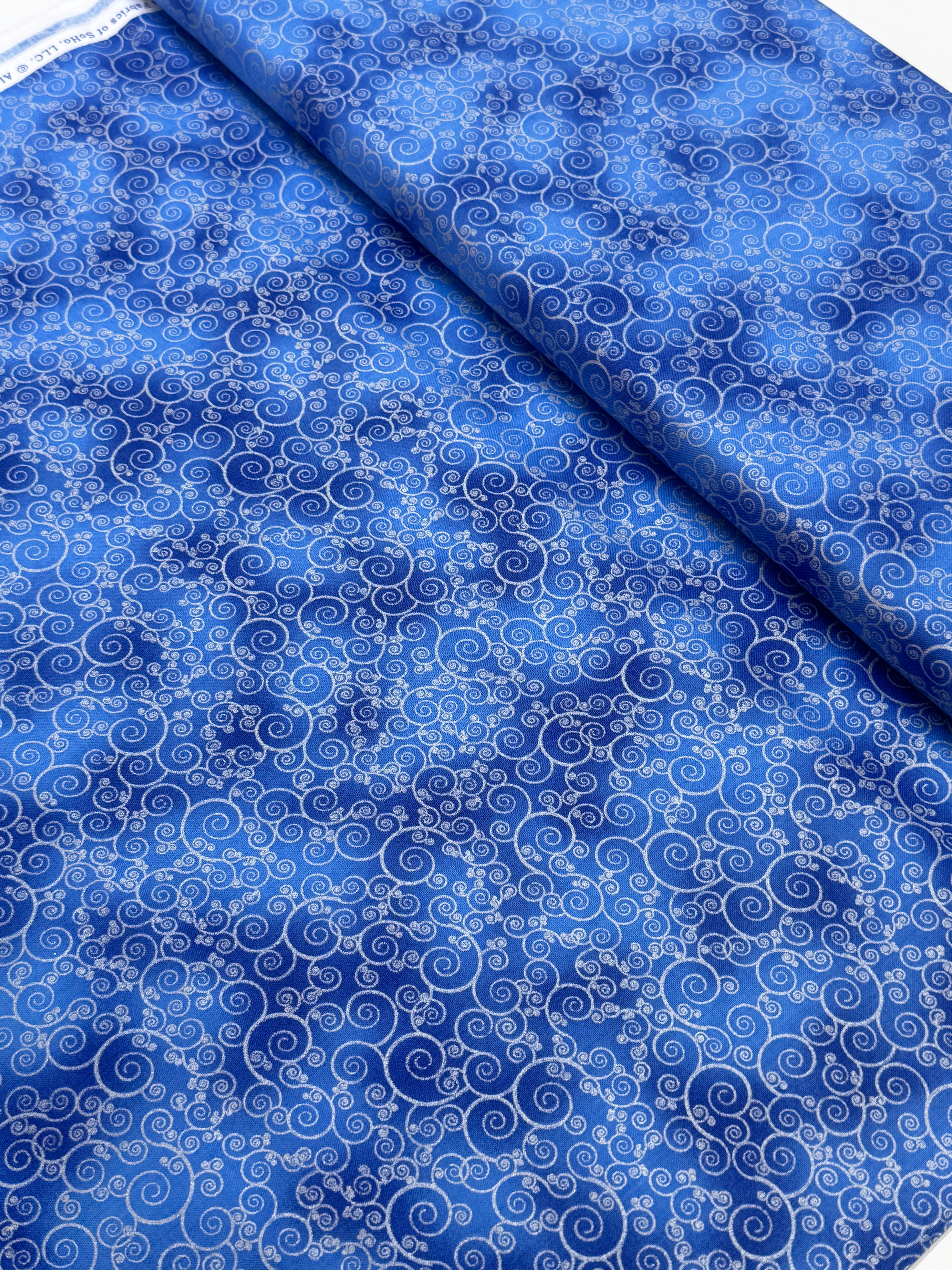 Ice Metallic Swirl Lapis fabric by Timeless Treasures, detail view