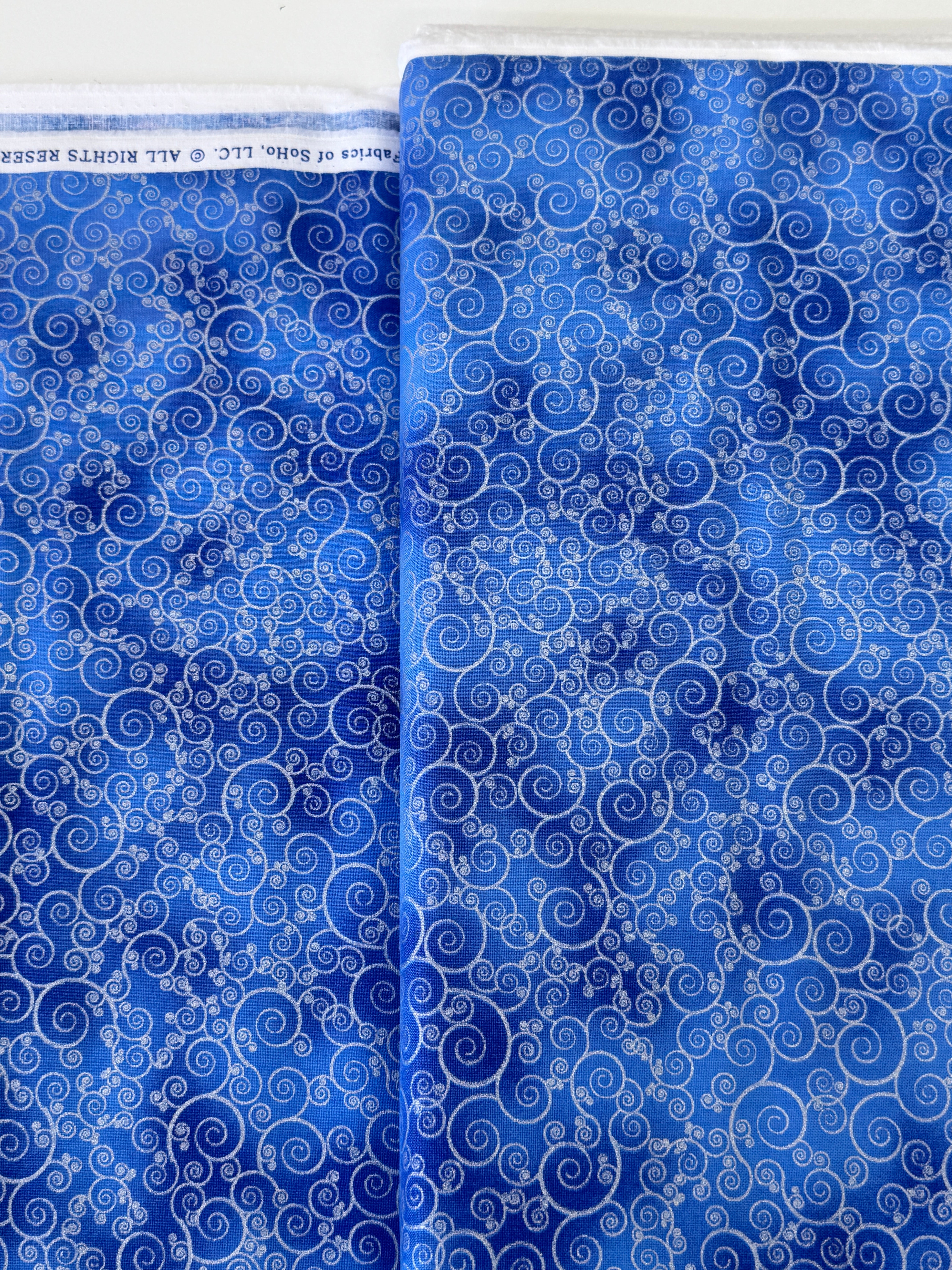 Ice Metallic Swirl Lapis fabric by Timeless Treasures, close-up