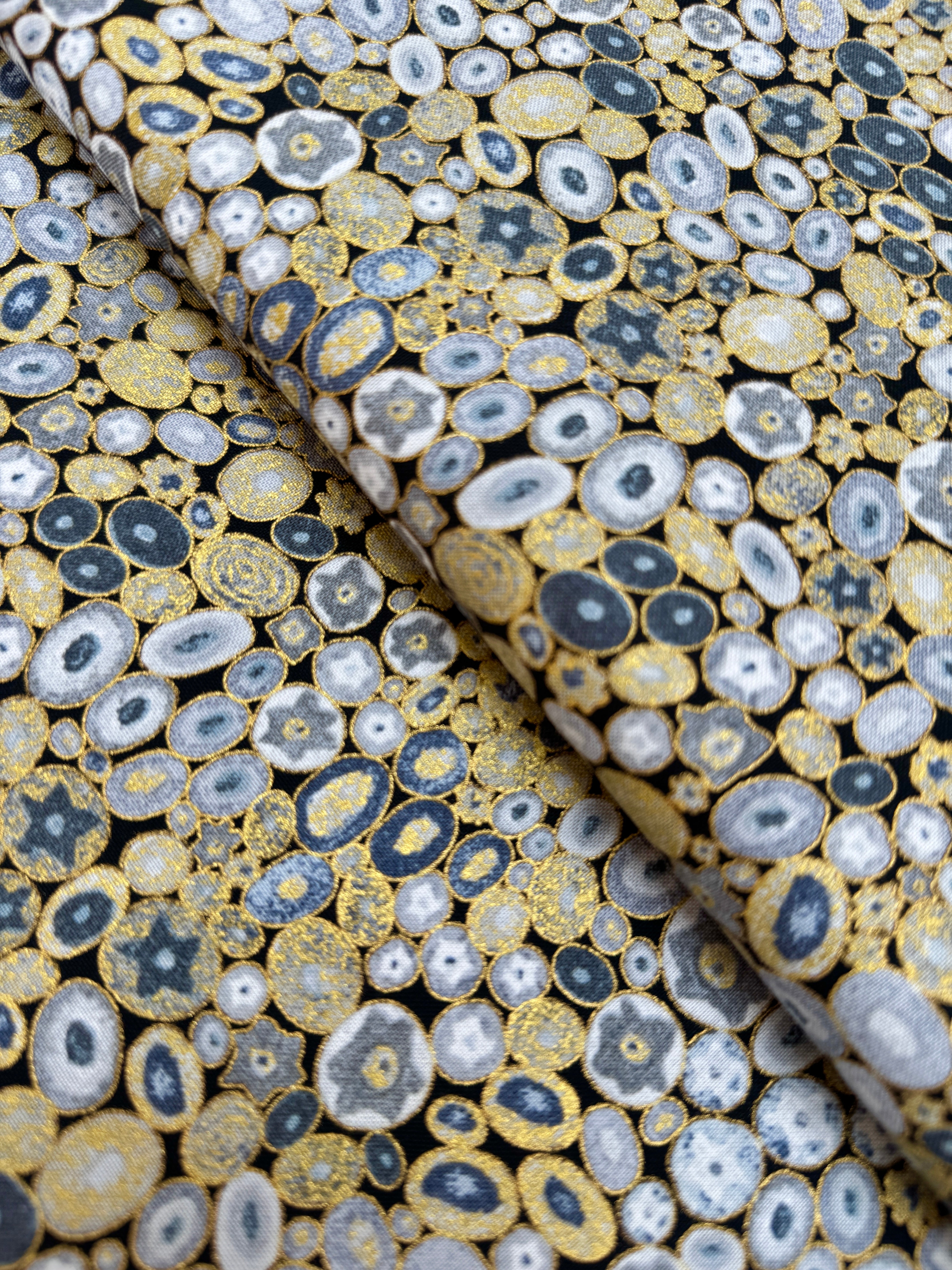 Gustav Klimt Grey Gold Metallic Fabric by Studio RK for Robert Kaufman – abstract metallic cotton in soft grey with gold accents.