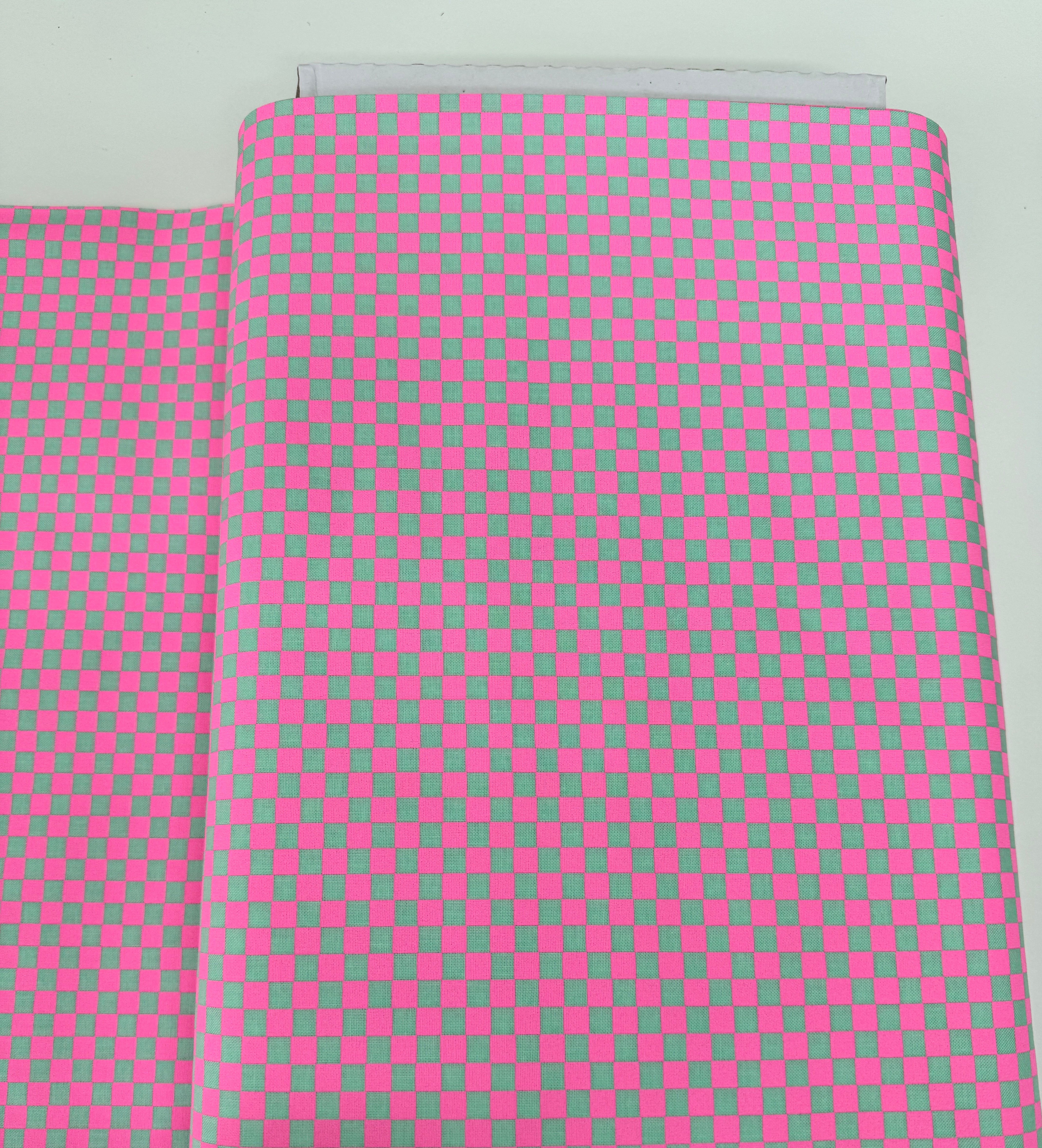Untamed – Check Please Cosmic Fabric by Tula Pink for Free Spirit. Checkerboard cotton with vivid neon and fluorescent accents.