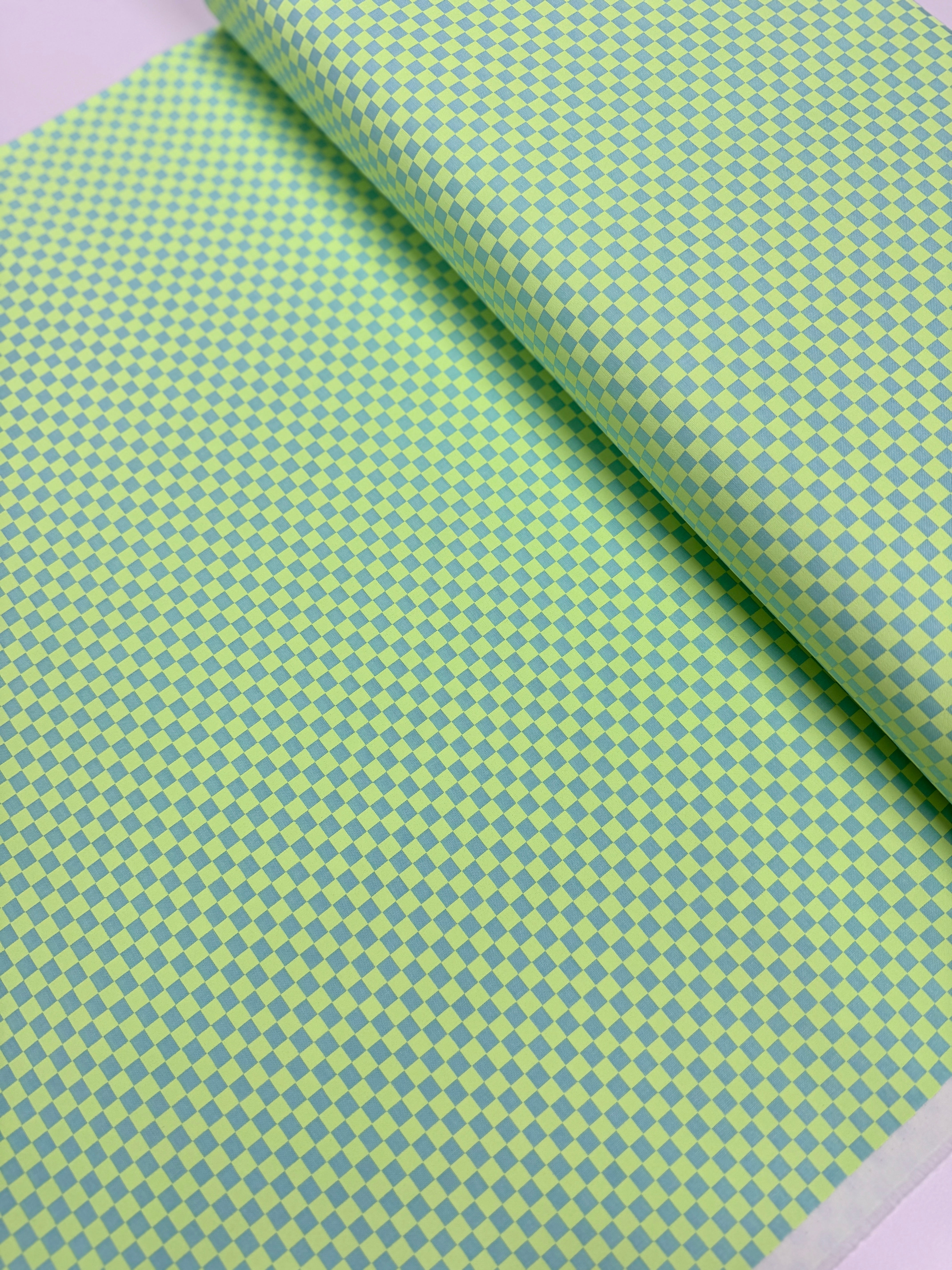 Check Please Moonbeam Fabric by Tula Pink – checkerboard cotton with neon and fluorescent accents for Free Spirit Fabrics.