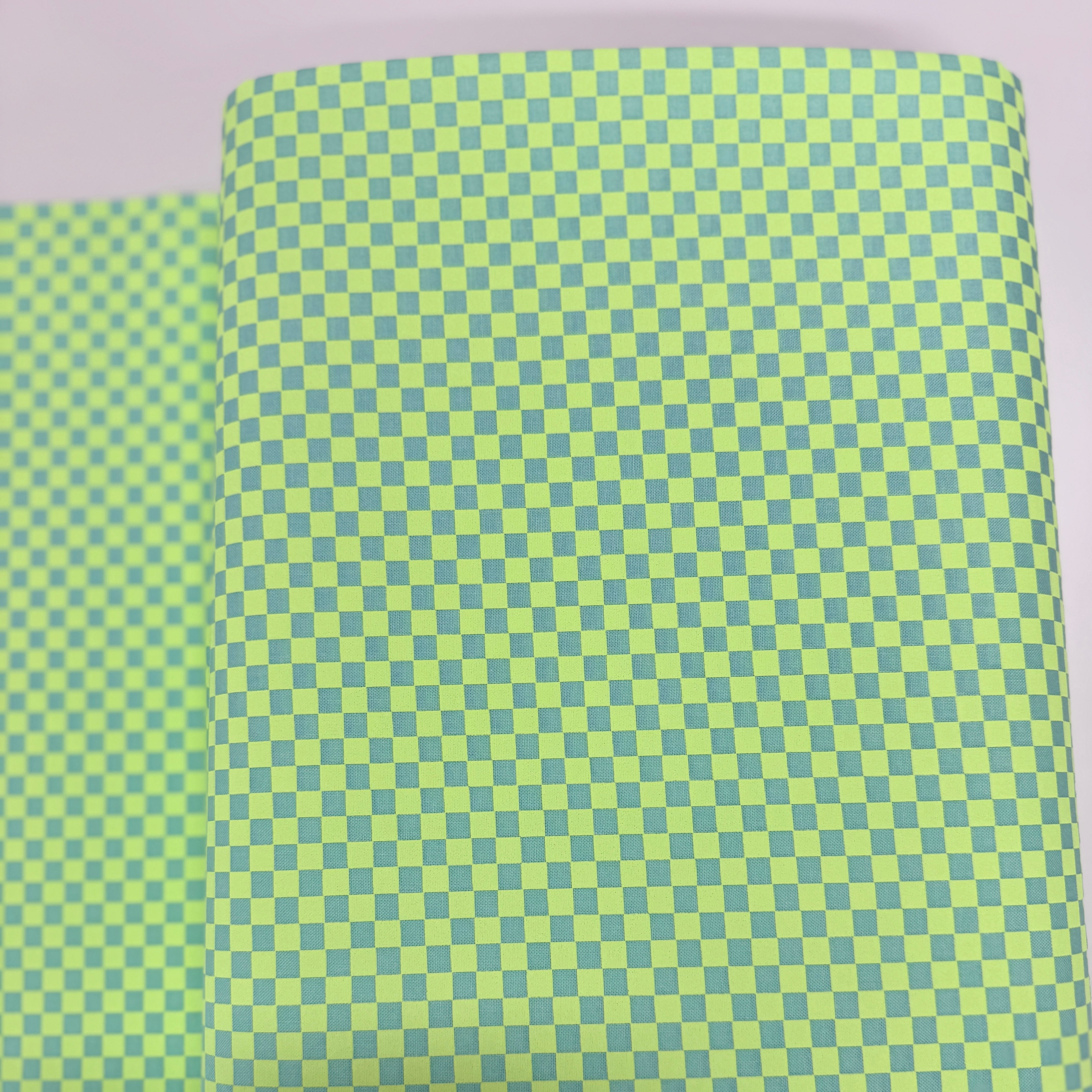 Check Please Moonbeam Fabric by Tula Pink – checkerboard cotton with neon and fluorescent accents for Free Spirit Fabrics.