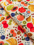 Fruit Stand Cream Canvas Fabric by Rifle Paper Co. – fruit-themed cotton canvas print from the Orchard collection for Cotton + Steel.