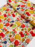 Fruit Stand Cream Canvas Fabric by Rifle Paper Co. – fruit-themed cotton canvas print from the Orchard collection for Cotton + Steel.
