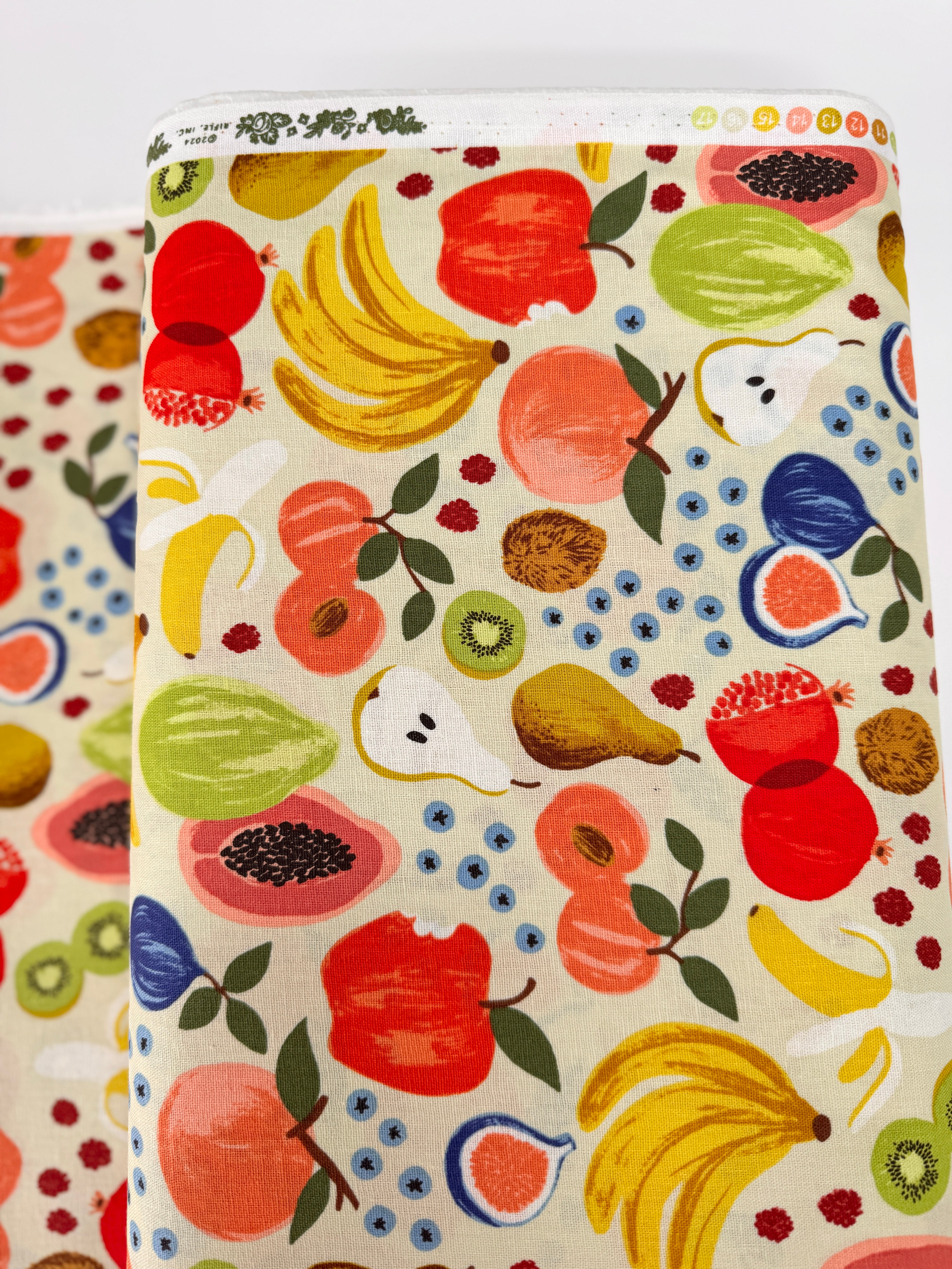 Fruit Stand Cream Canvas Fabric by Rifle Paper Co. – fruit-themed cotton canvas print from the Orchard collection for Cotton + Steel.