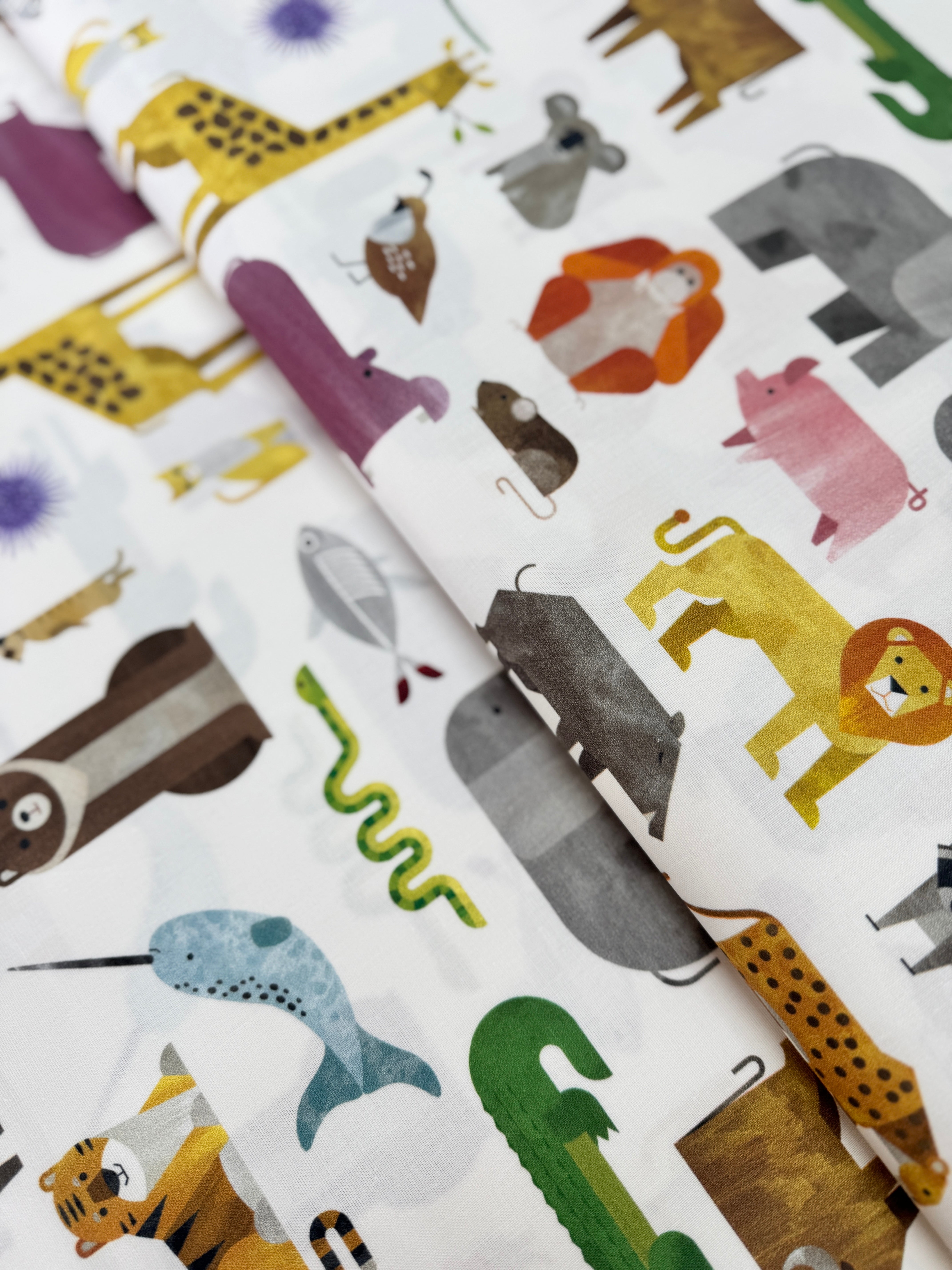 A to Z Animals fabric by Robert Kaufman – alphabet and animals print on 100% cotton for kids and nursery projects.